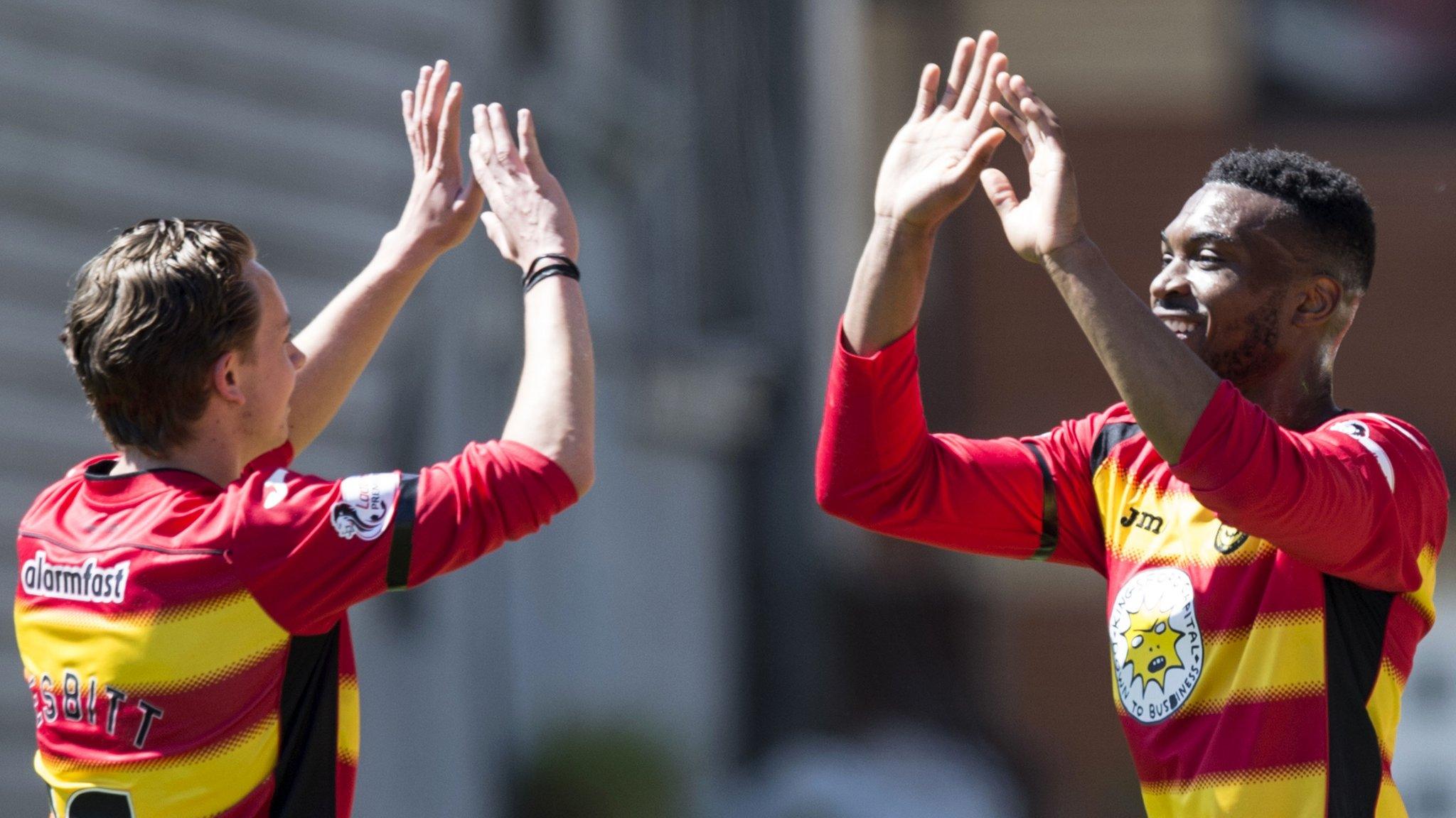 Patrick Amoo (right) celebrates his goal for Thistle