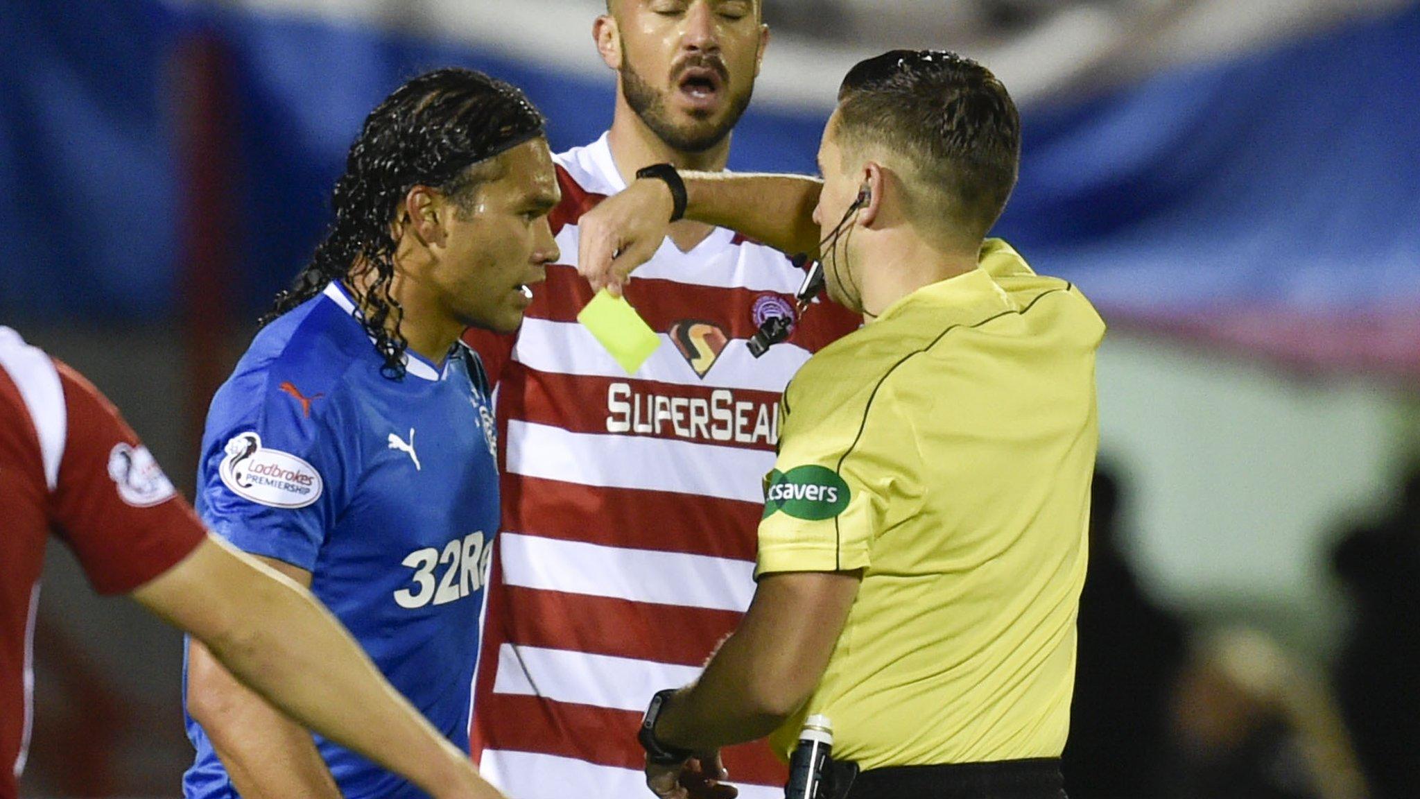 Rangers' Carlos Pena is yellow-carded against Hamilton