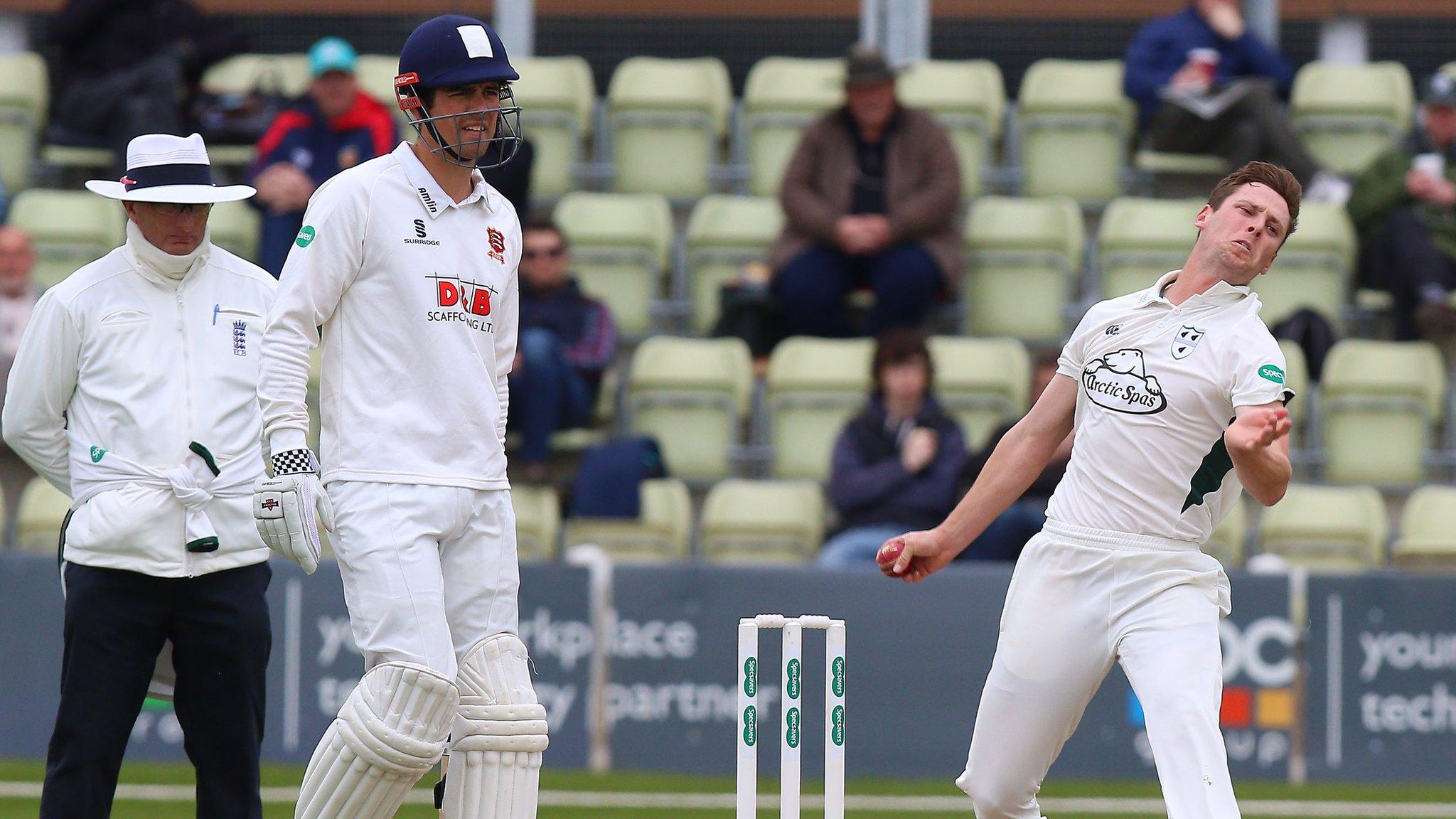 England captain Alastair Cook and New Zealand Test bowler Matt Henry