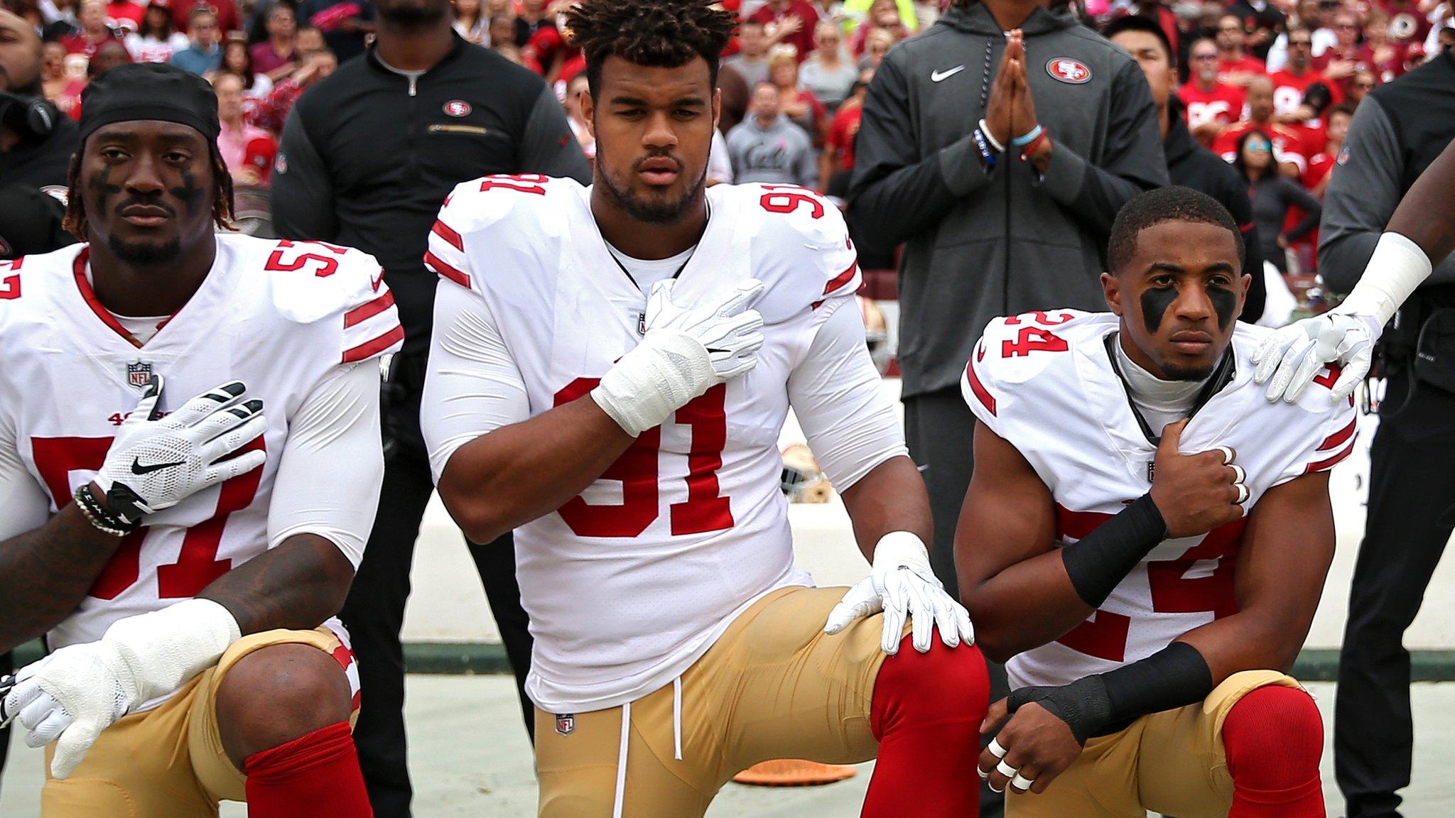 San Francisco 49ers kneeling