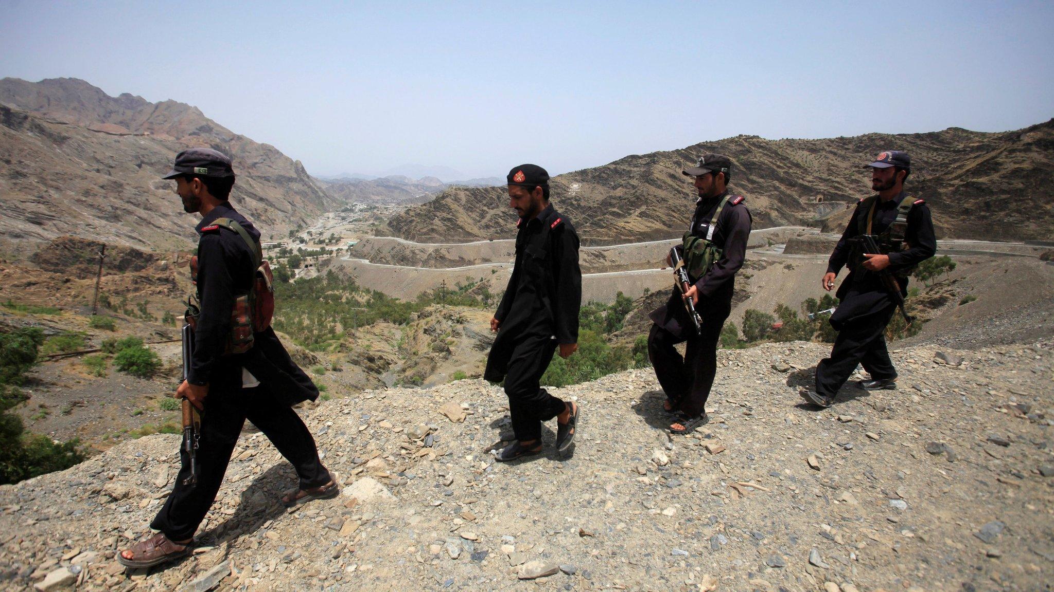 Members of Pakistan's Frontier Corps patrol the border with Afghanistan outside Torkham, on 16 June 2016