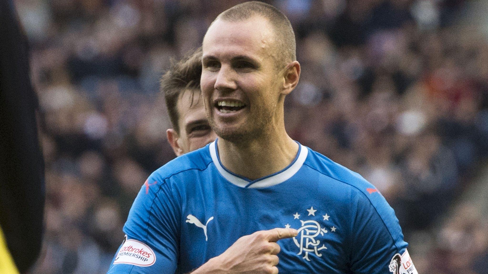 Rangers striker Kenny Miller celebrates