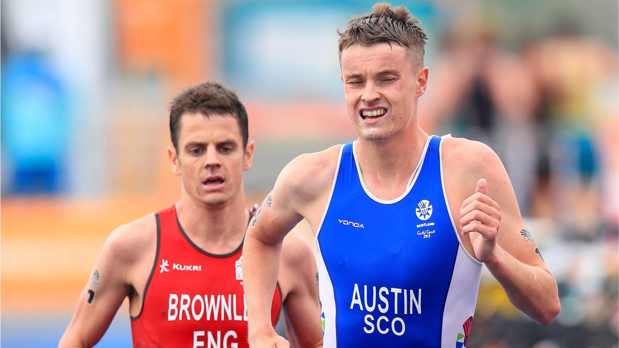 Scotland's Marc Austin in front of England's Jonny Brownlee