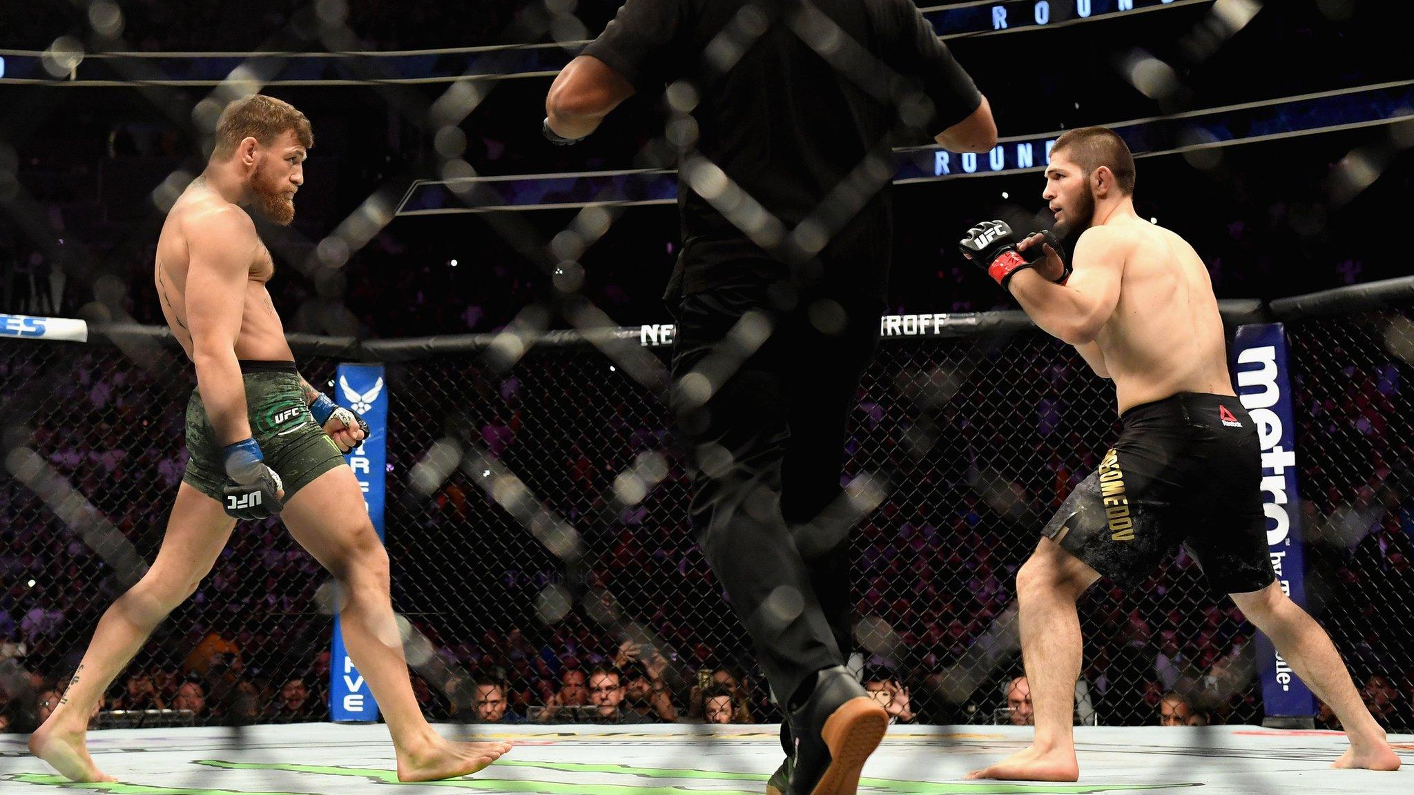Las Vegas, United States, October 6: Khabib Nurmagomedov, right, and Conor McGregor face off at the start of their UFC lightweight championship bout at UFC 229.(Photo by Harry How/Getty Images)
