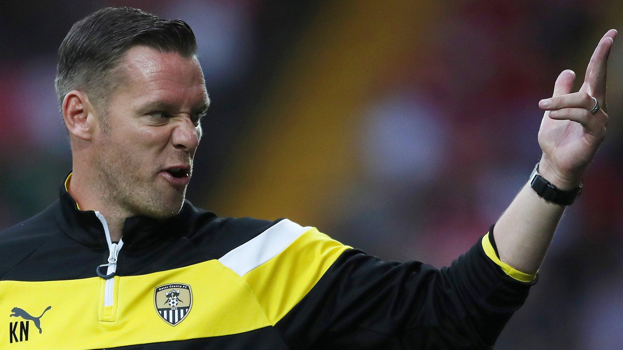 Notts County manager Kevin Nolan signalling to his players from the touchline