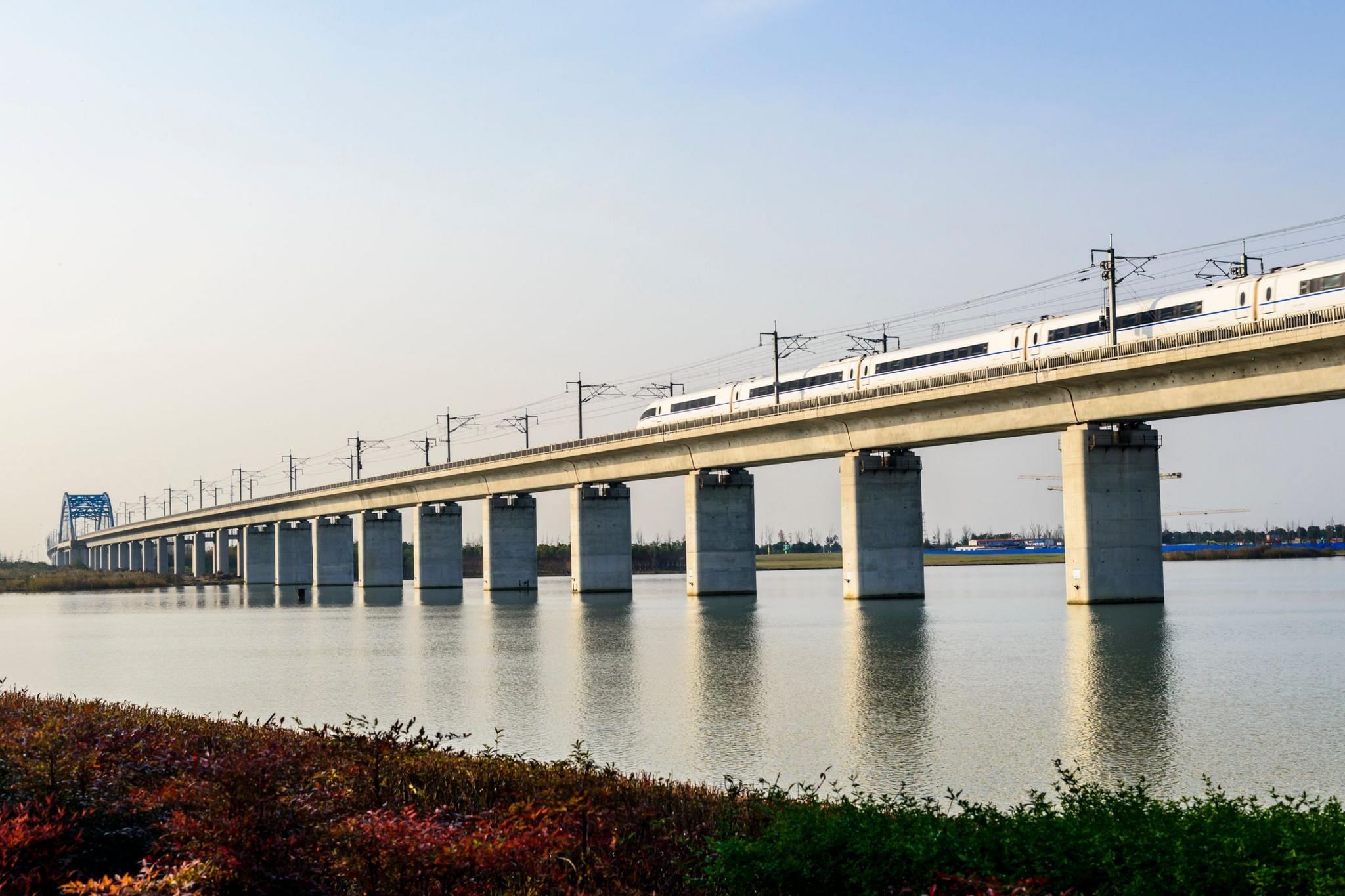 Danyang–Kunshan Grand Bridge with a train crossing it.