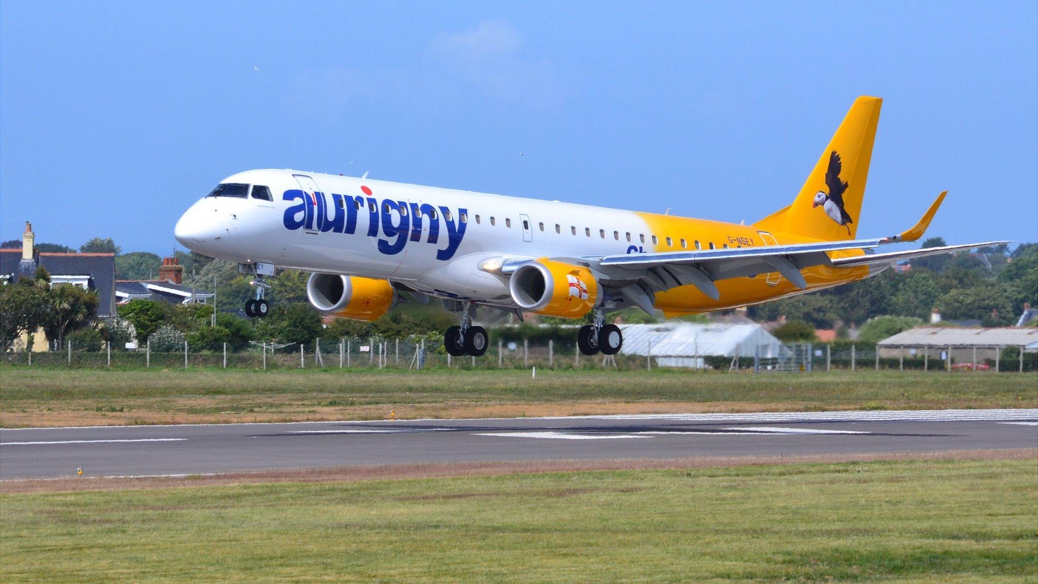 Aurigny Embraer 195 landing at Guernsey Airport