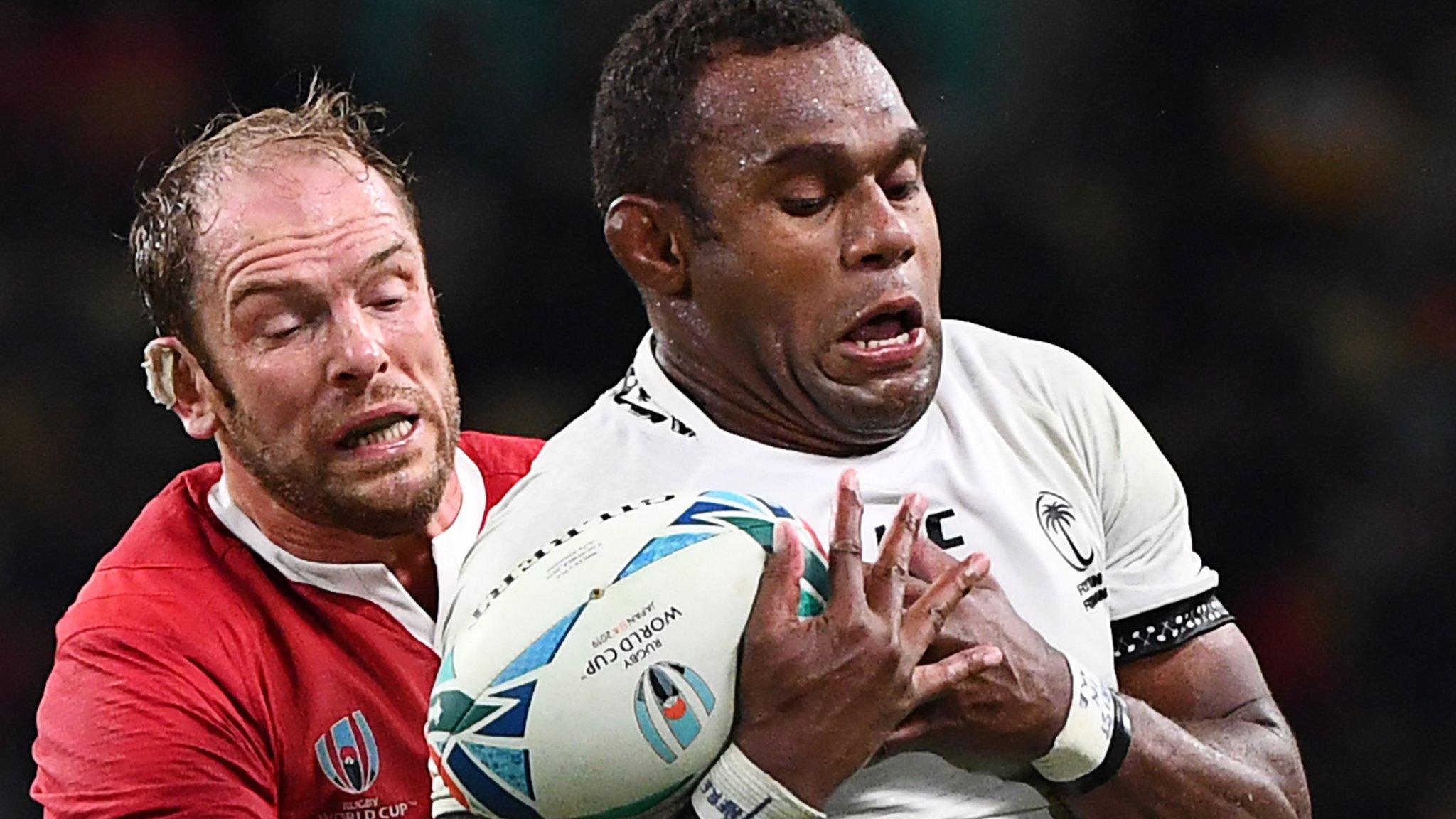 Alun Wyn Jones of Wales challenges Fiji's Leone Nakarawa for the ball