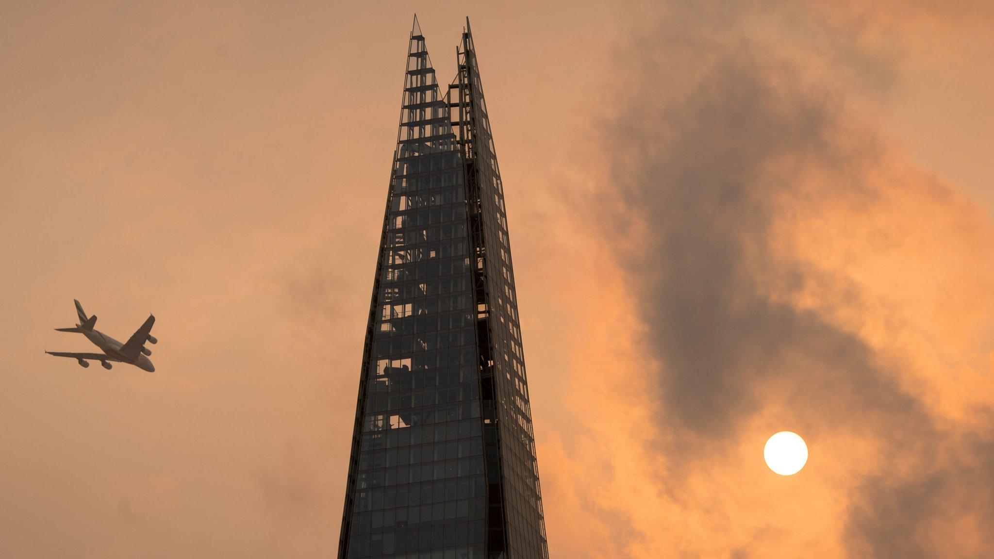 Red sun in sky above Shard