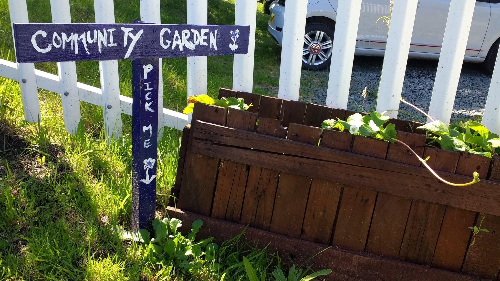 Planter and Community Garden sign at Green Road train station near Millom, Cumbria