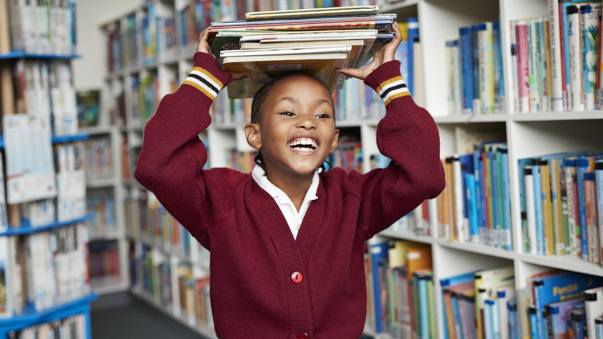 girl-with-books-on-head