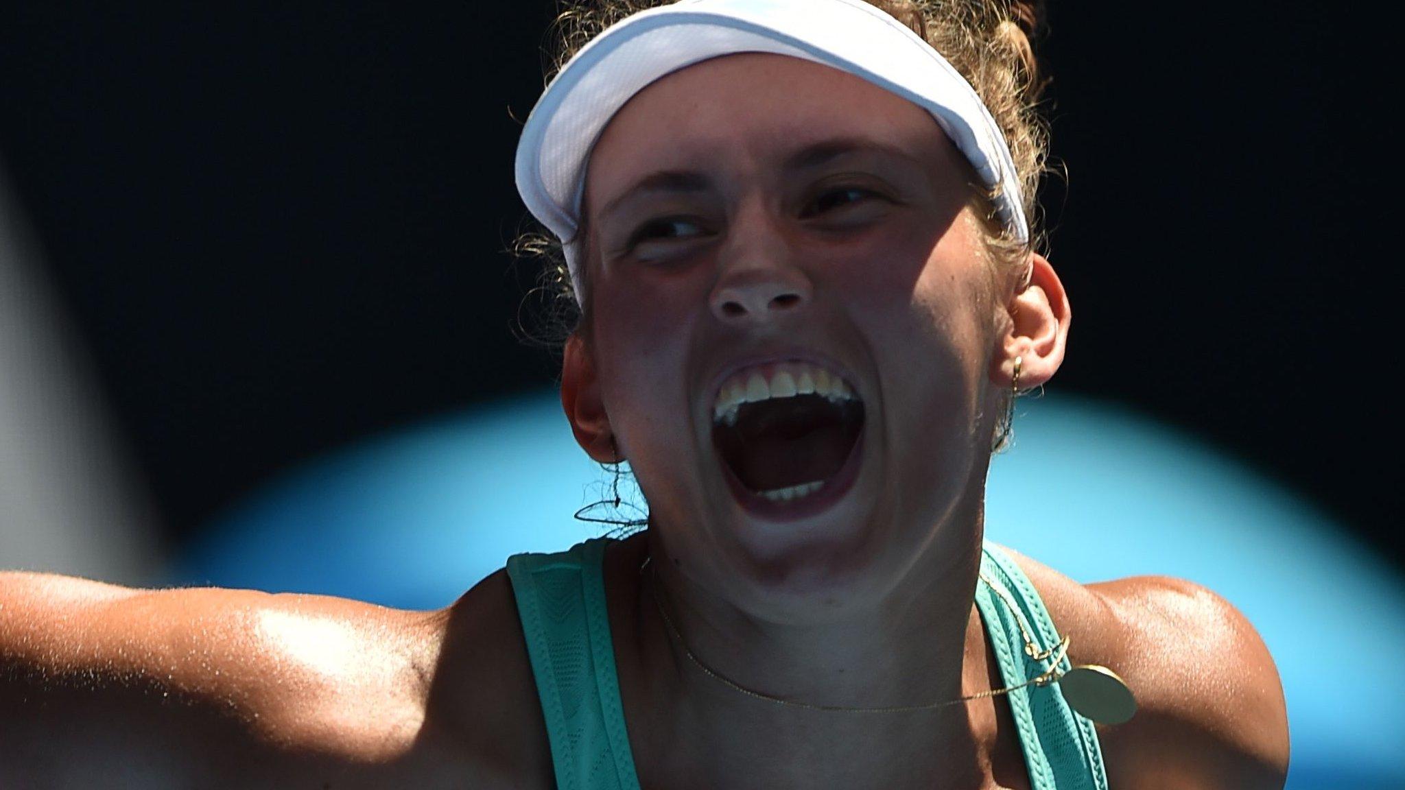 Elise Mertens celebrates against Elina Svitolina