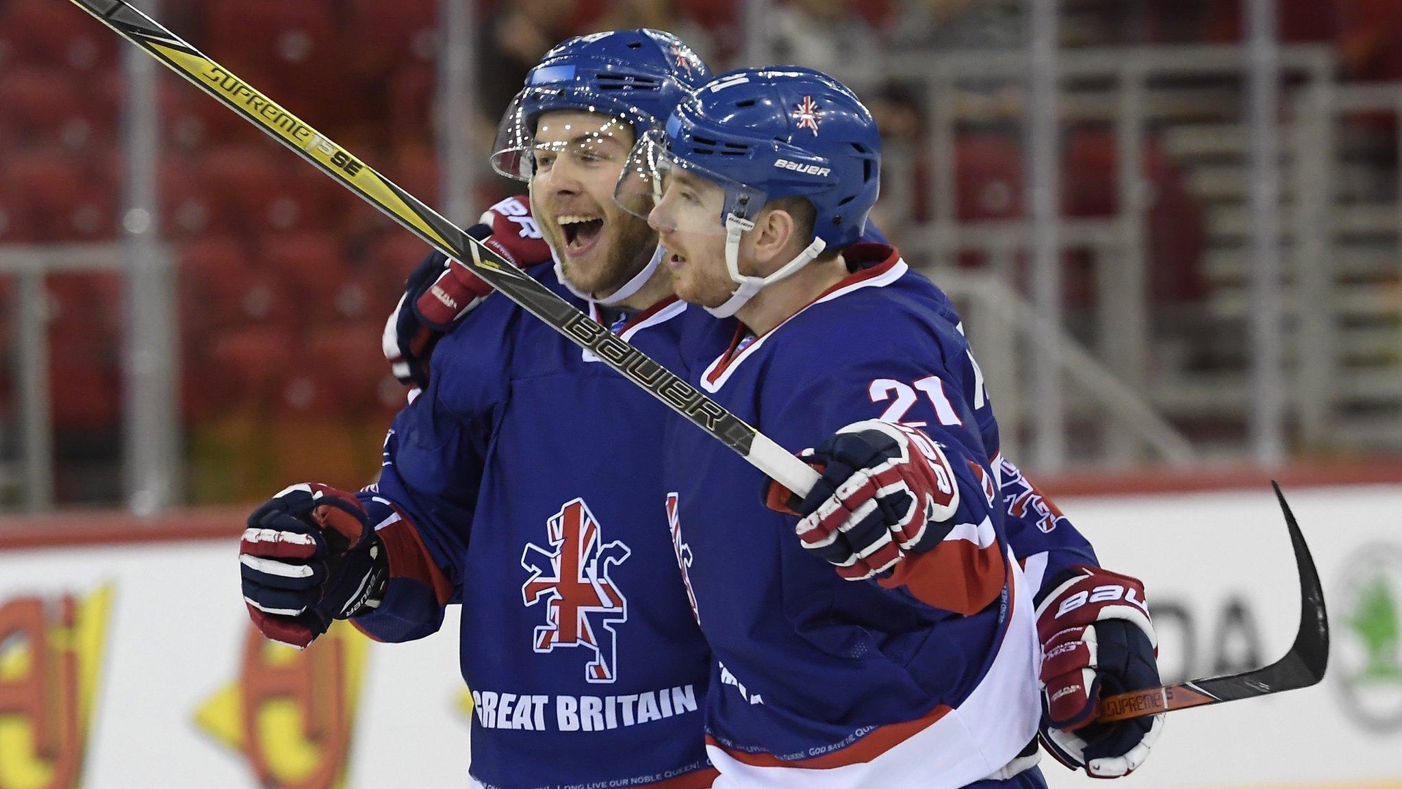 GB's Brett Perlini and Mike Hammond celebrate