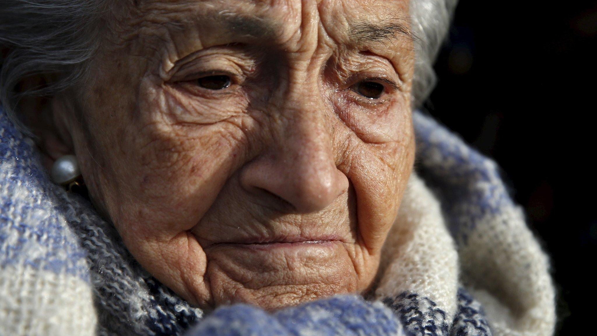 Ascension Mendieta, daughter of Timoteo Mendieta, who was shot in 1939, attends the exhumation of her father's remains at Guadalajara's cemetery, Spain, on 19 January 2016