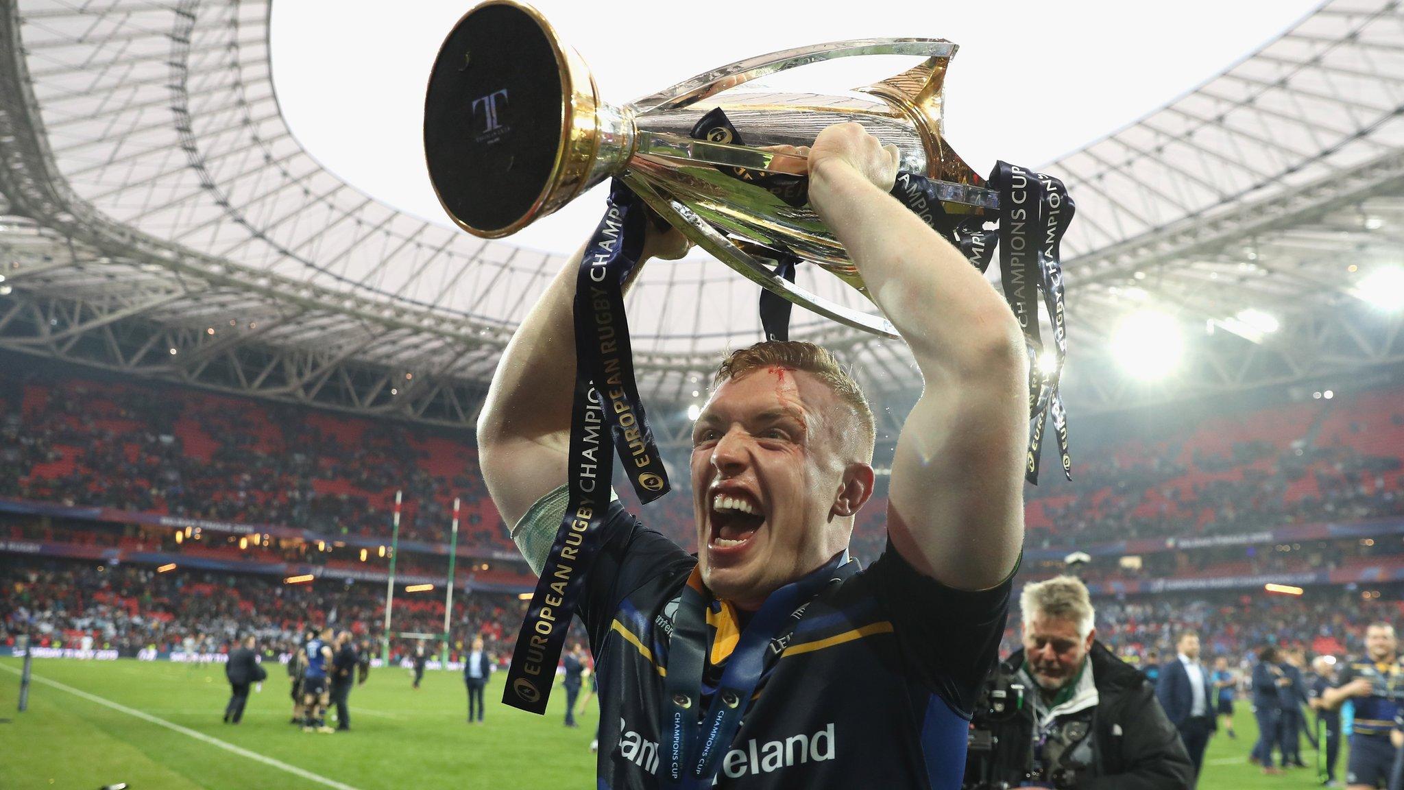 Leinster's Dan Leavy hoists aloft the European Champions Cup