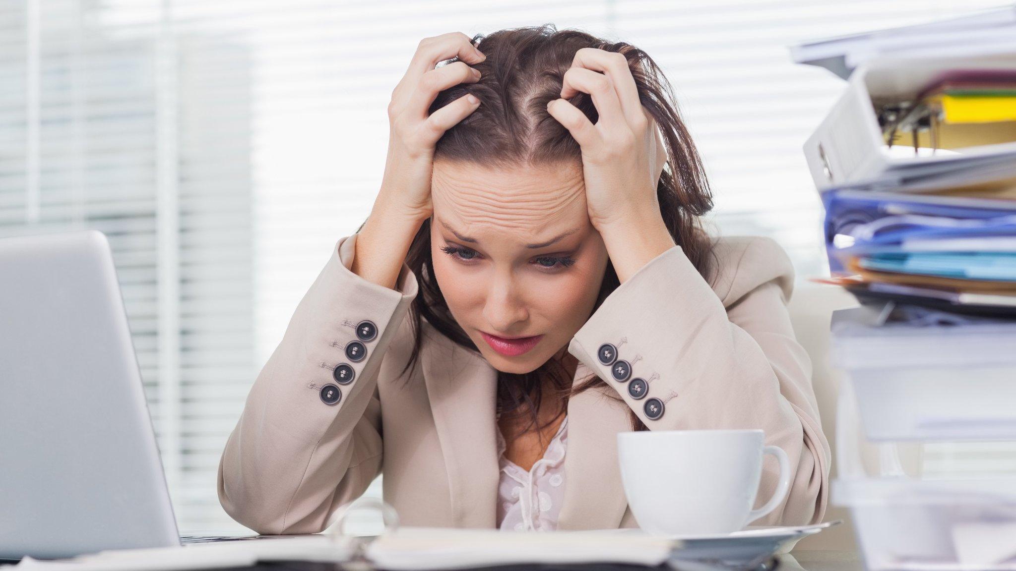 Woman tearing her hair out