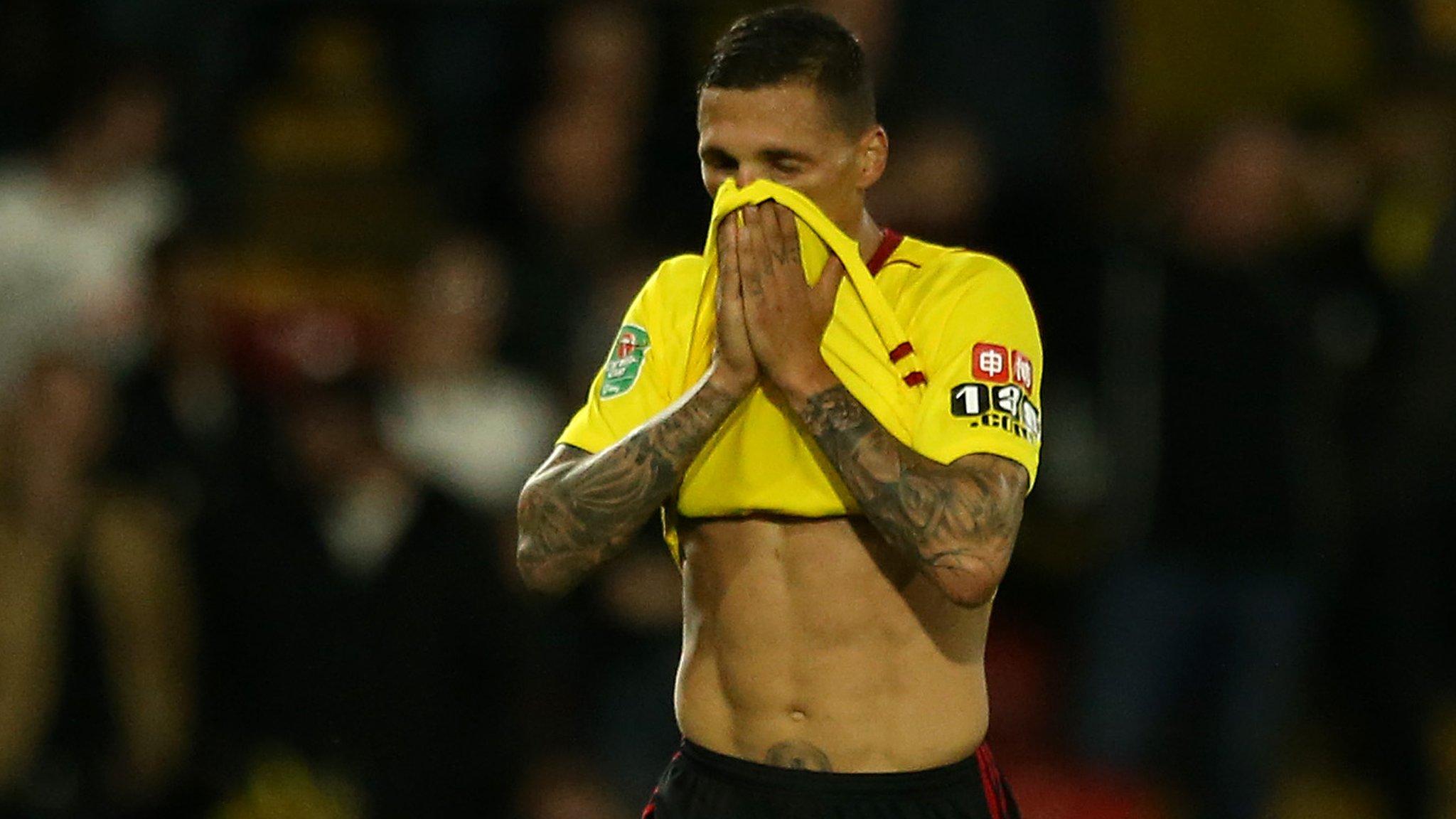 Watford defender Jose Holebas walks off after being sent off against Bristol City