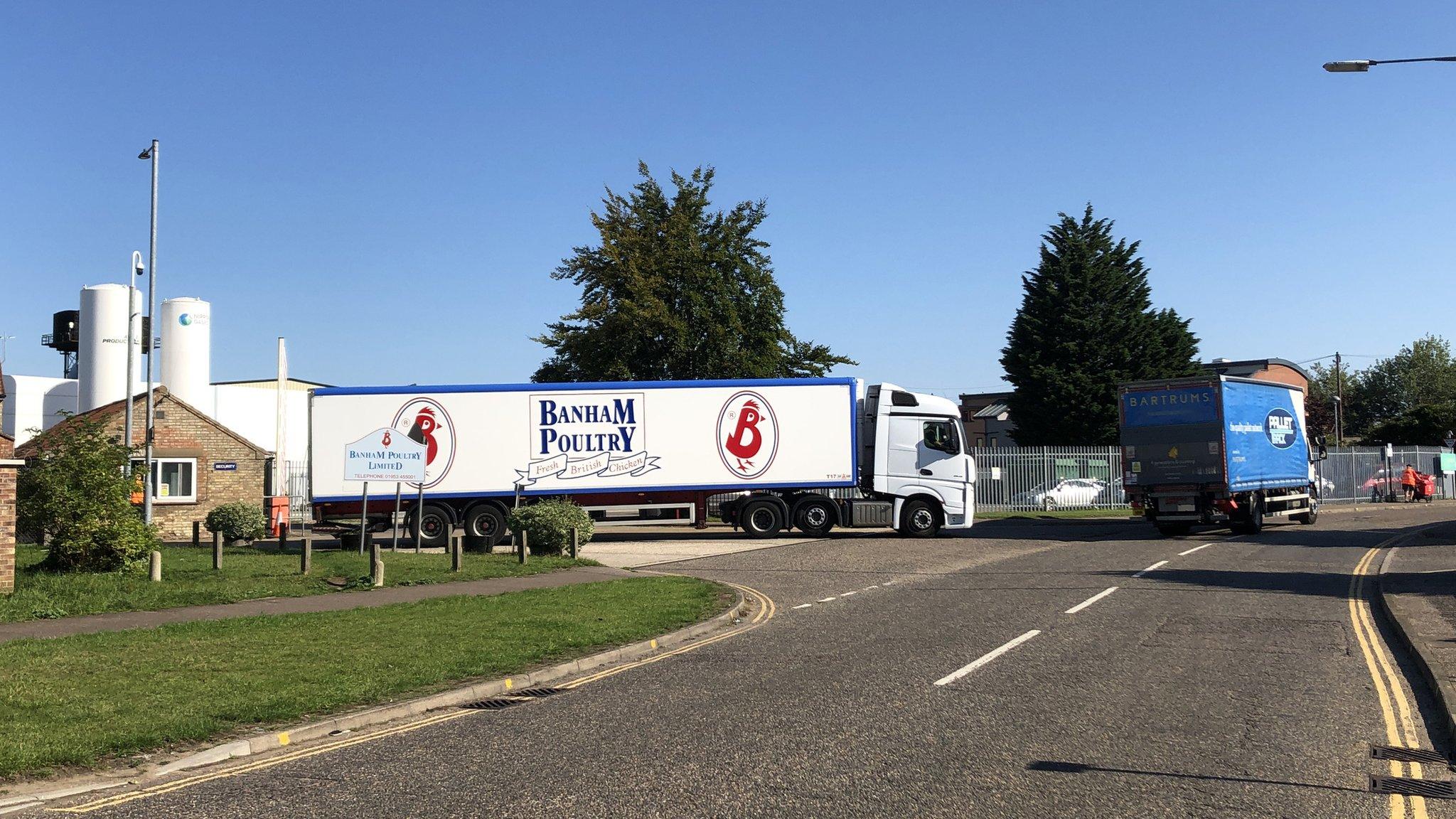 Lorries leaving Banham Poultry