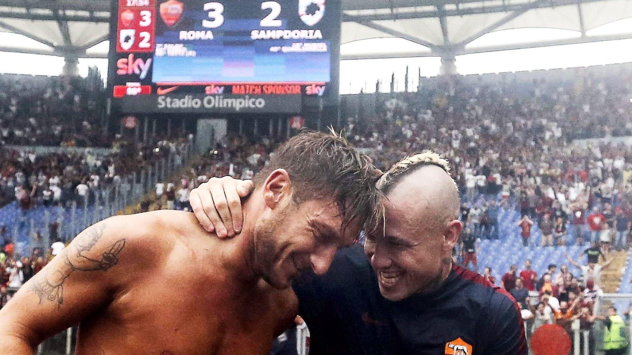 Francesco Totti celebrates with Radja Nainggolan