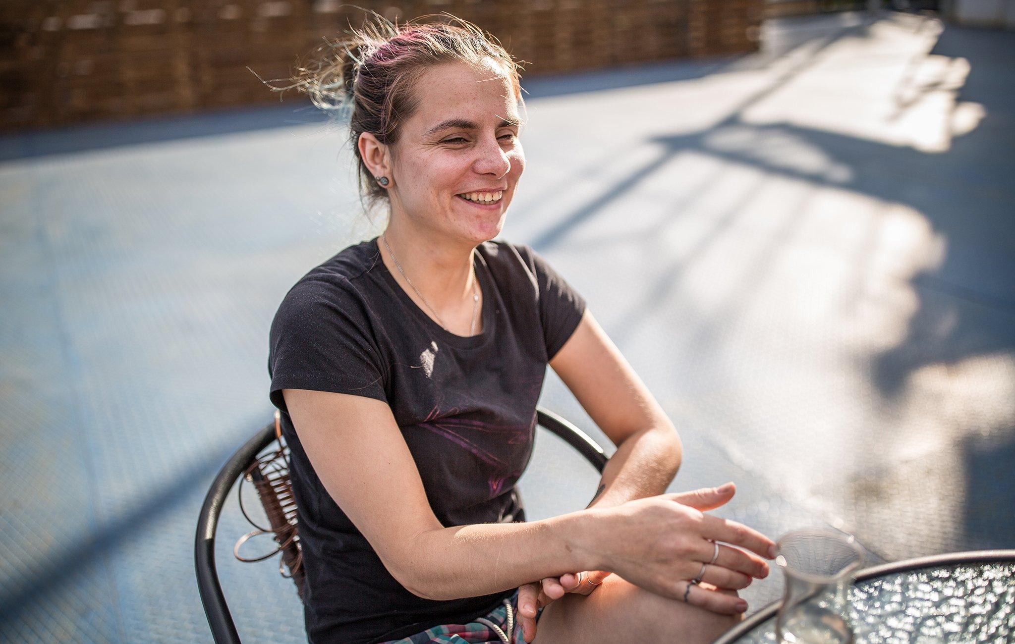 Varya, from Horizontal, with a cup of tea on a roof terrace