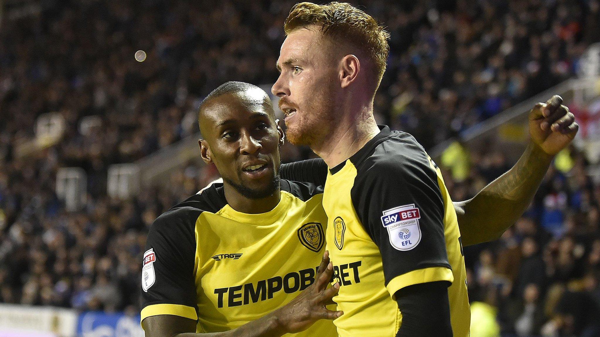 Burton's players celebrate victory over Reading