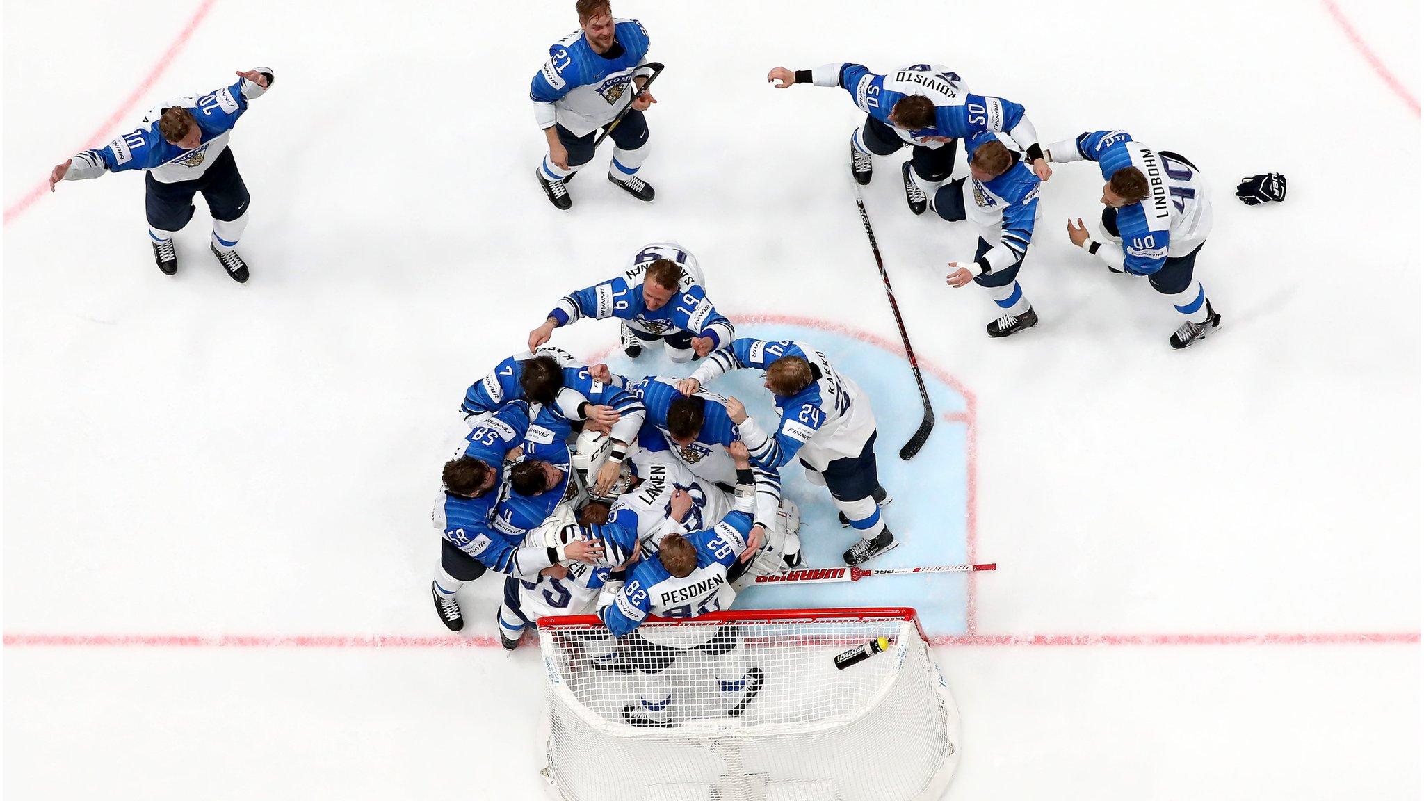 Bratislava, Slovakia - 26 May: Finland goaltender Kevin Lankinen (#30) celebrates with his team-mates after beating Canada in the 2019 IIHF Ice Hockey World Championship gold-medal game at Ondrej Nepela Arena. (Photo by Martin Rose/Getty Images)