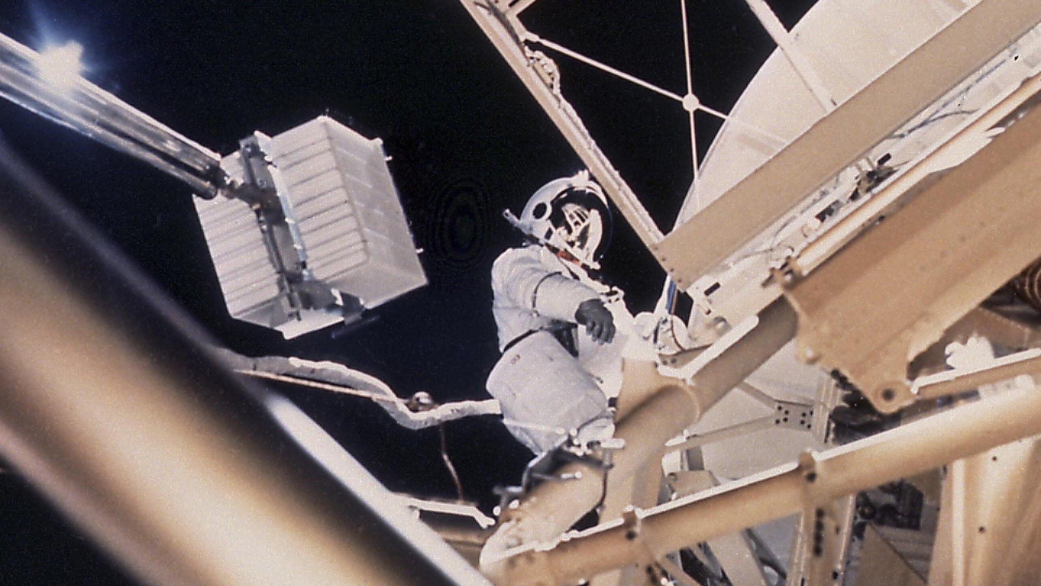 Owen Garriott works outside Skylab