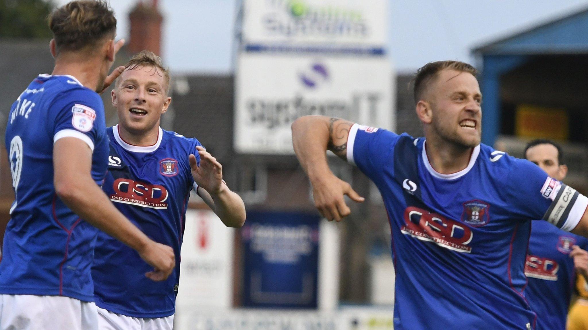 Carlisle players celebrate