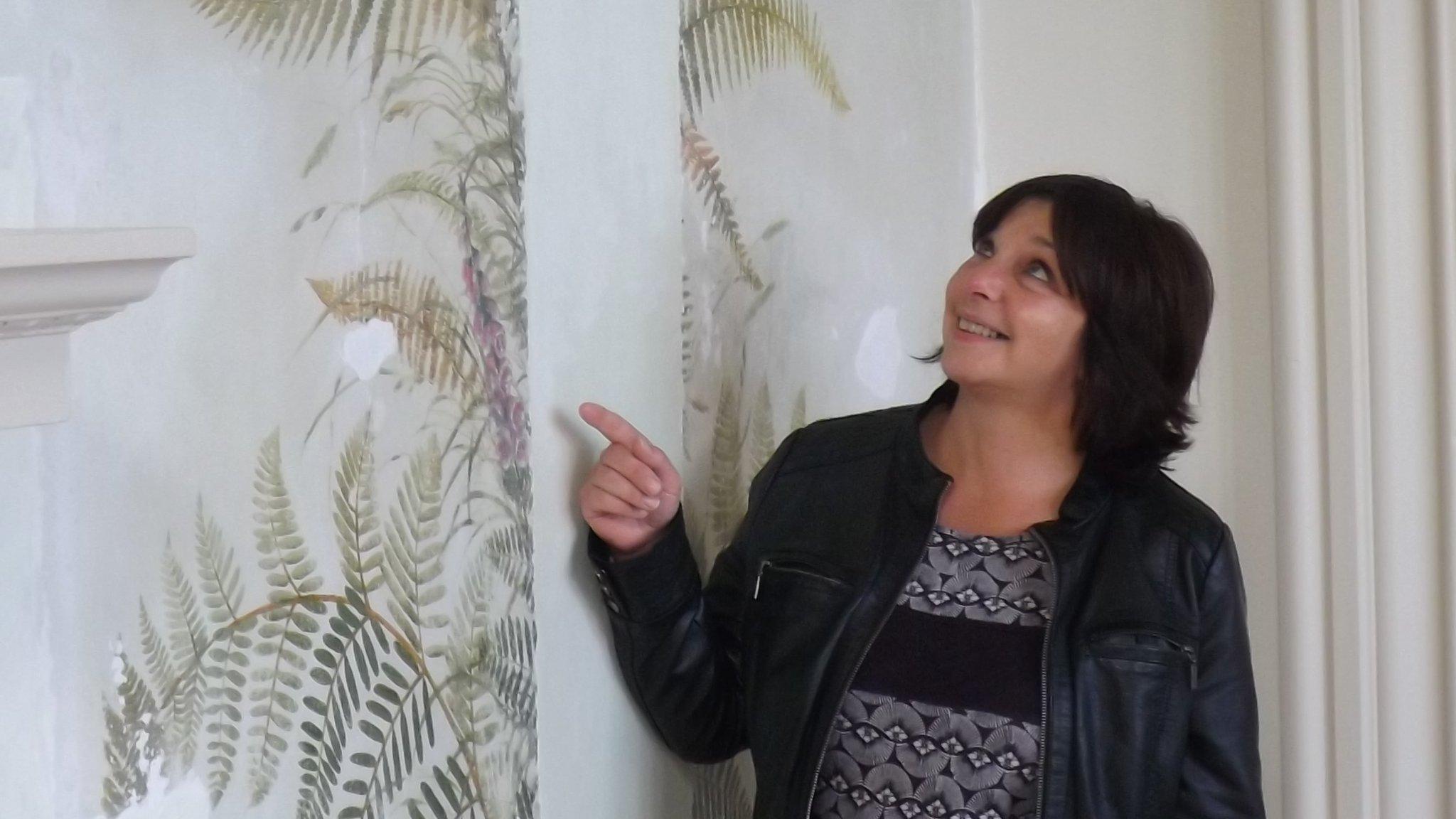 Lews Castle regeneration officer Tina Maclean with wall paintings