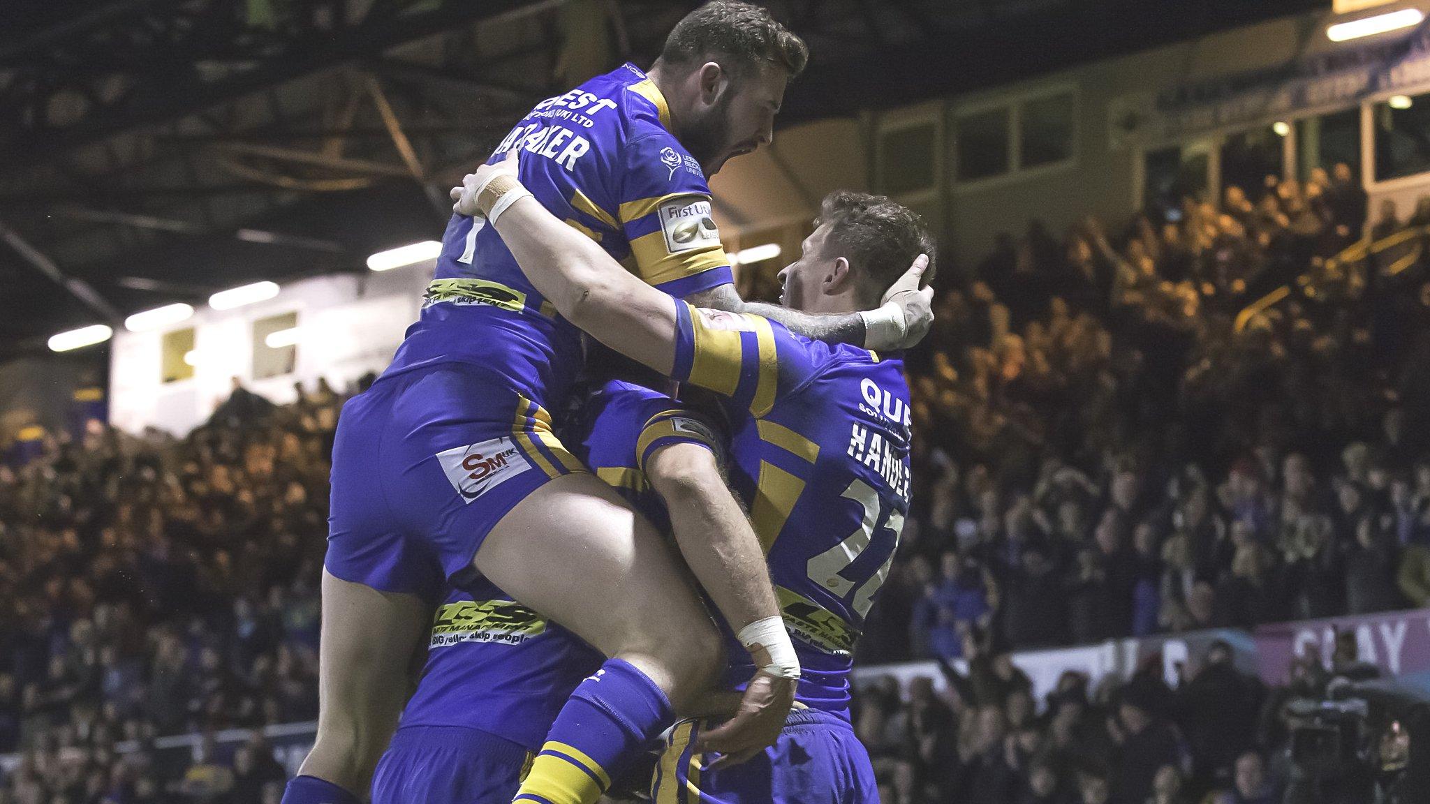 Leeds celebrate Ash Handley's try