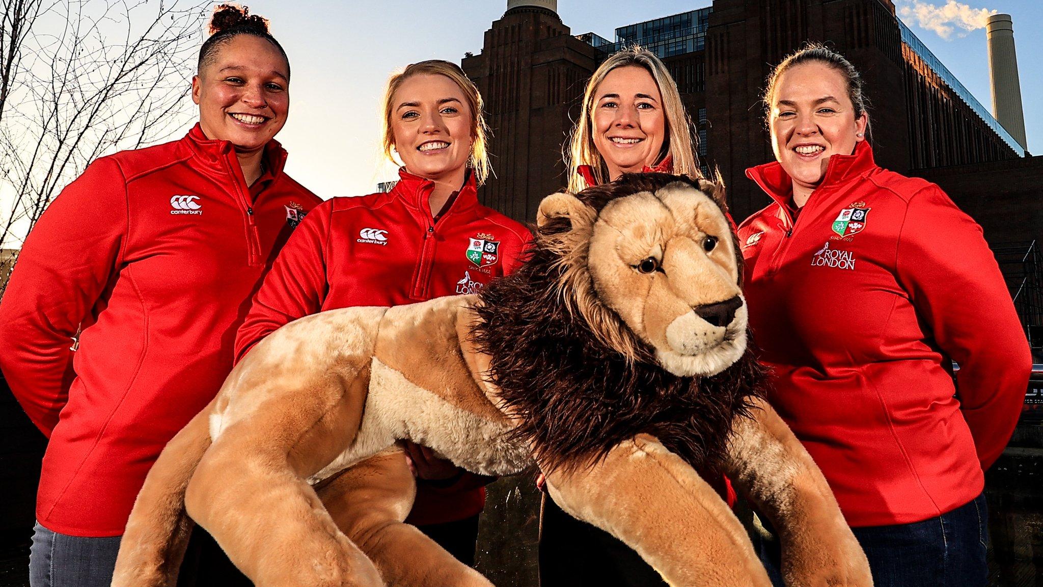 Potential British and Irish Lions players pose with a lion mascot