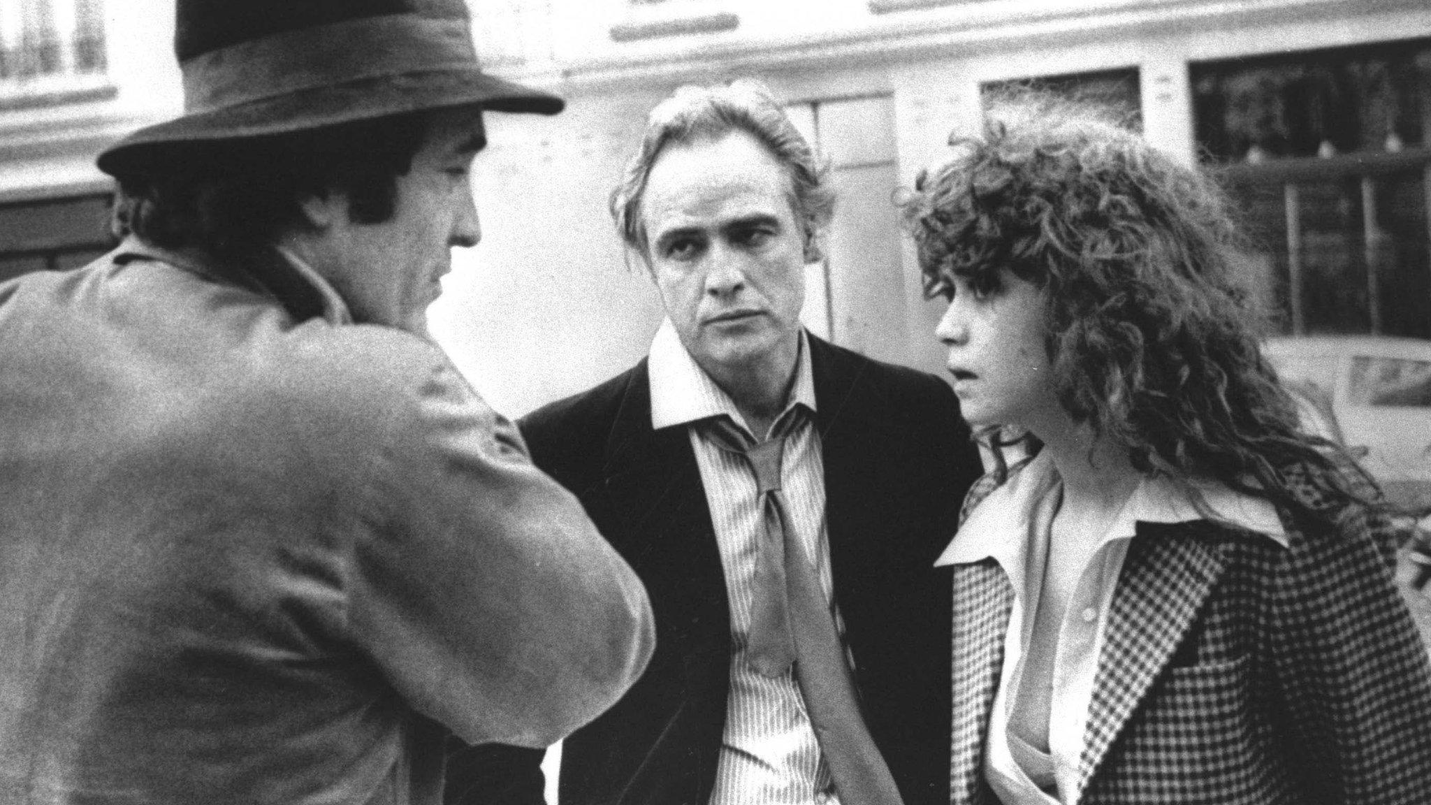 Bernardo Bertolucci (left) with Marlon Brando and Maria Schneider