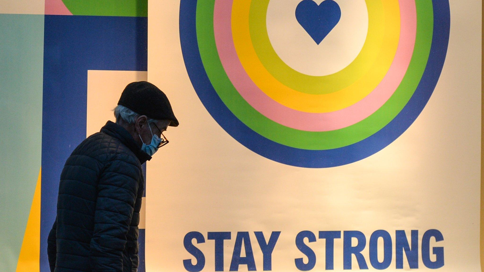 A sign tells the public to stay strong during the covis-19 pandemic