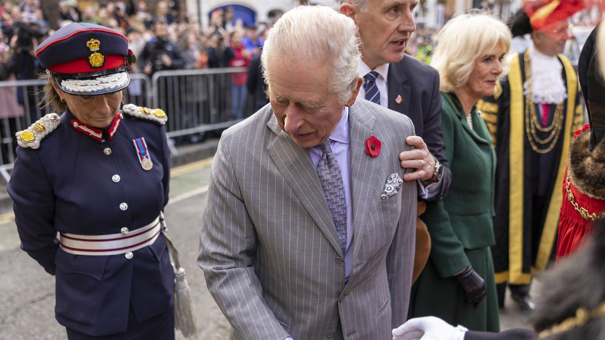 King Charles III reacts after an egg was thrown his direction as he arrived for a ceremony at Micklegate Bar in York