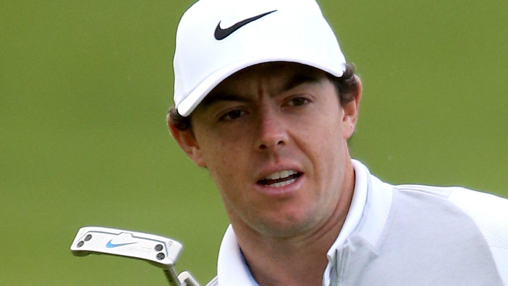 Rory McIlroy reacts to a missed putt on Thursday