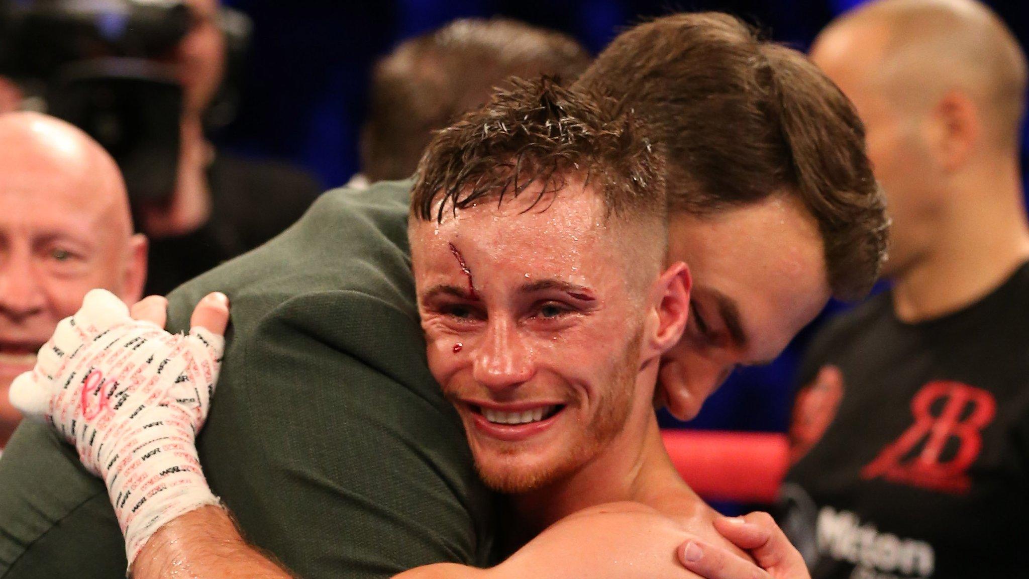 Ryan Burnett is embraced by his promoter Eddie Hearn after his world title triumph on Saturday