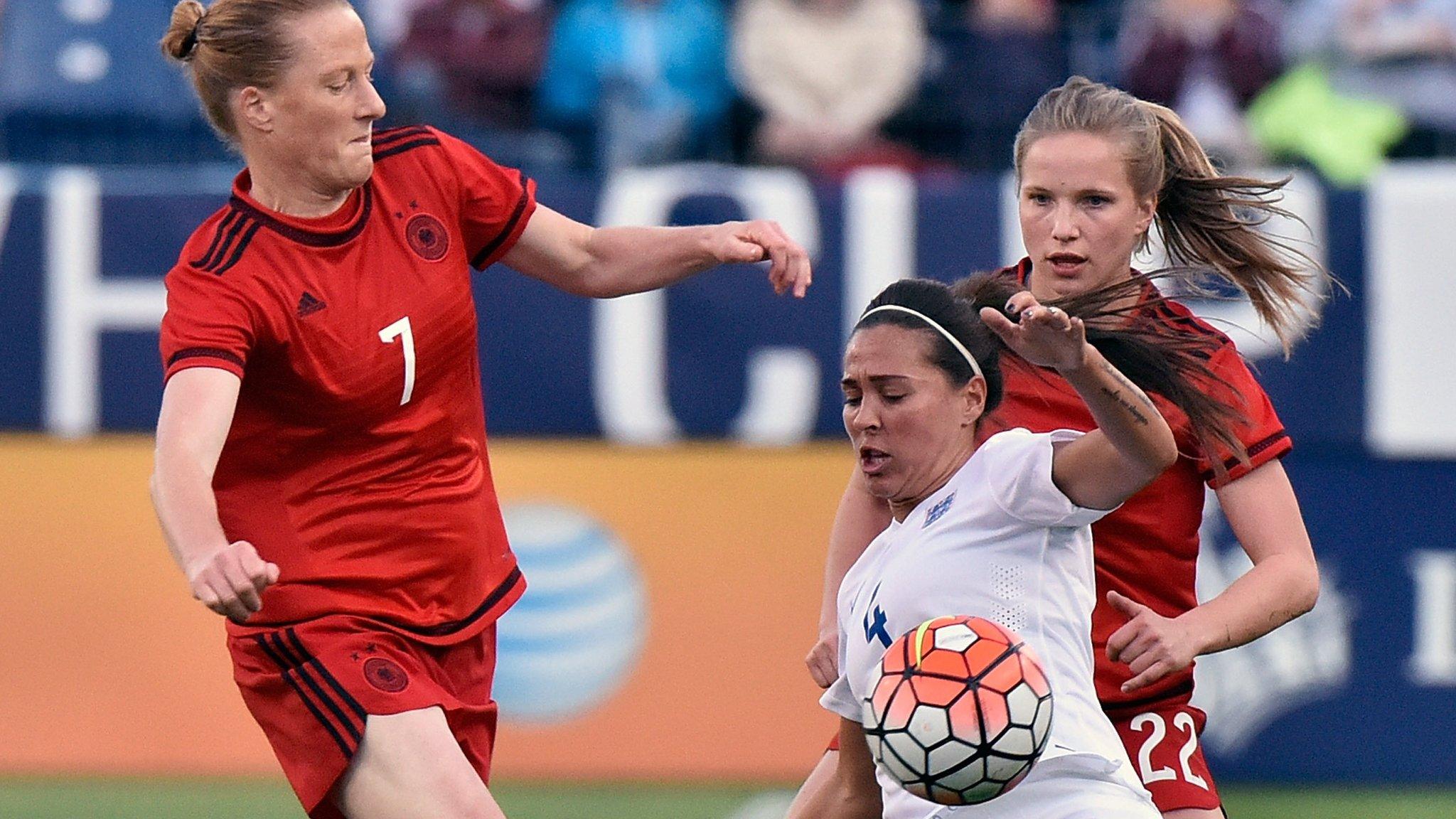 England's Fara Williams challenges for the ball against Germany