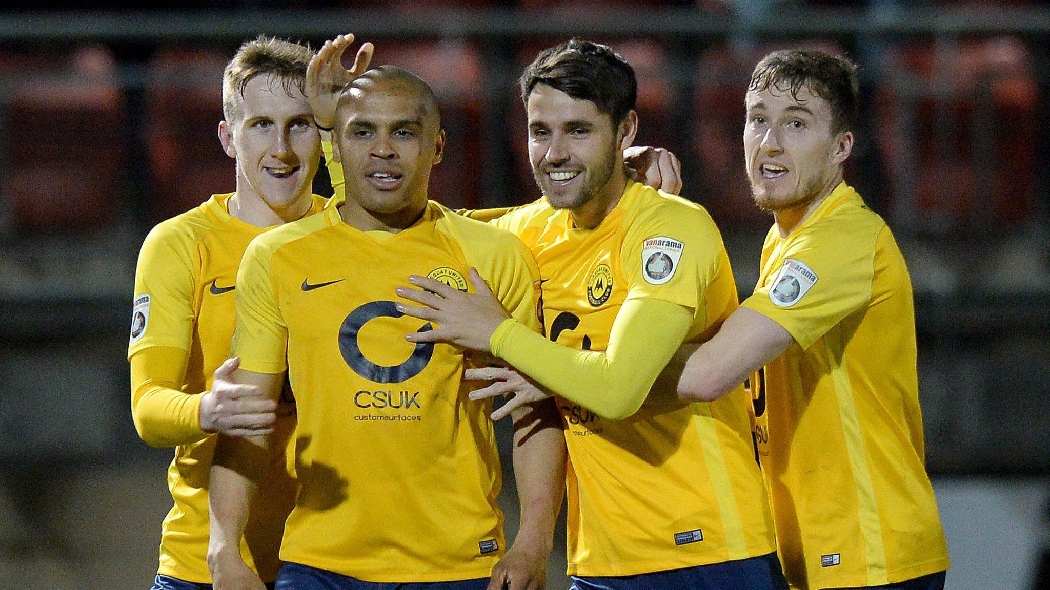 Elliott Romain celebrates scoring for Torquay United