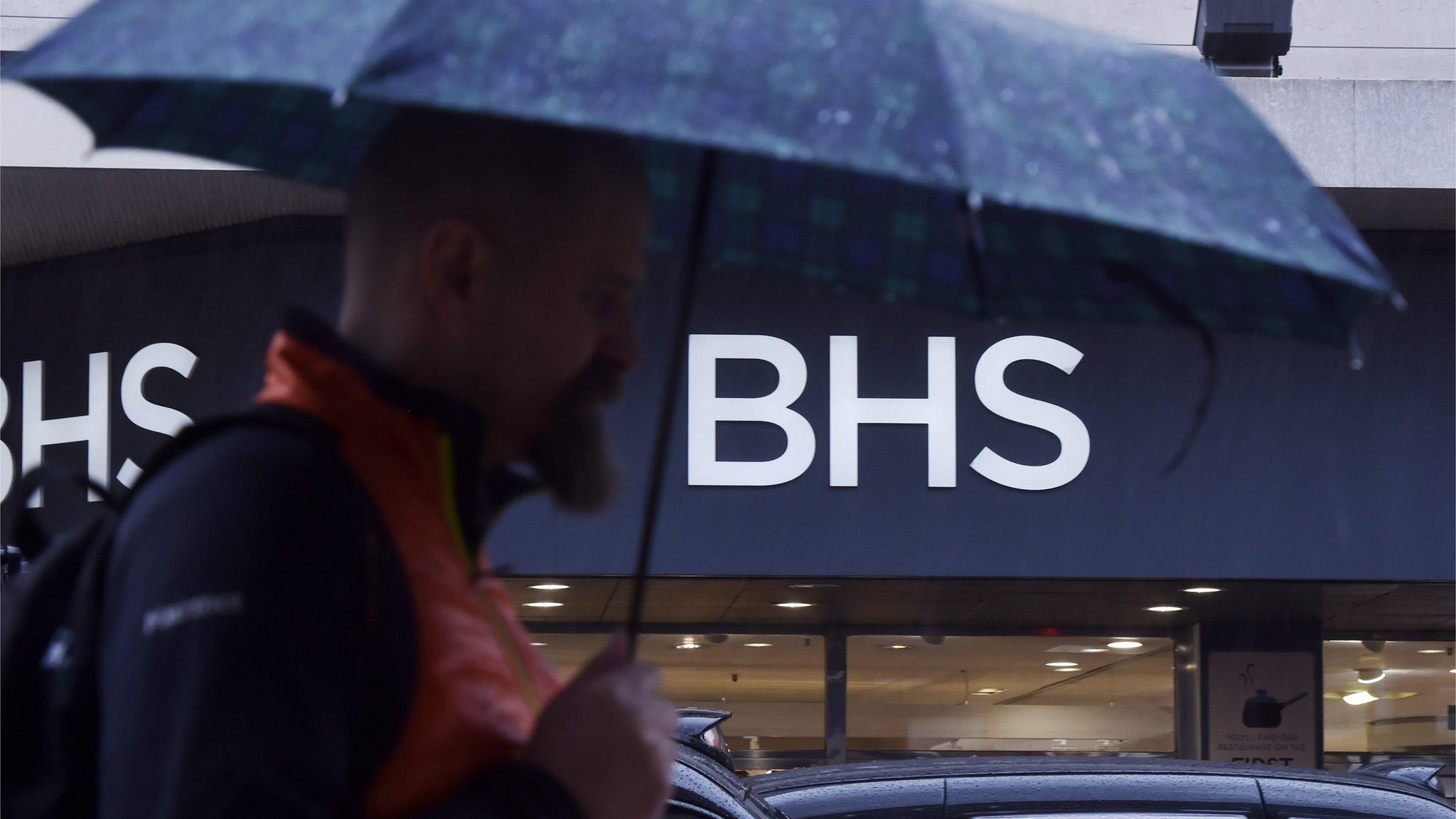 Shopper walks past BHS on Oxford Street