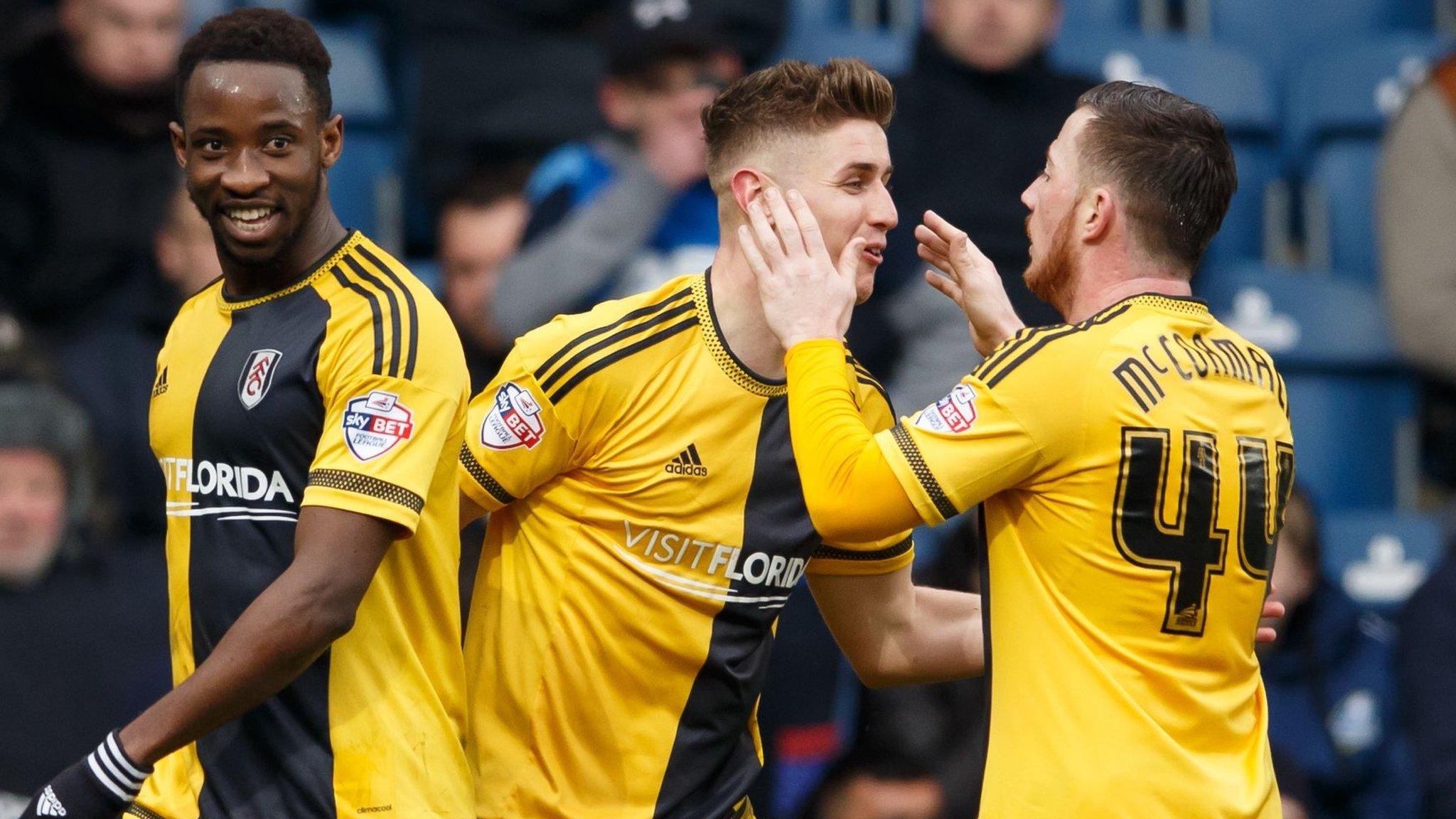 Fulham celebrate making it 3-0 v QPR