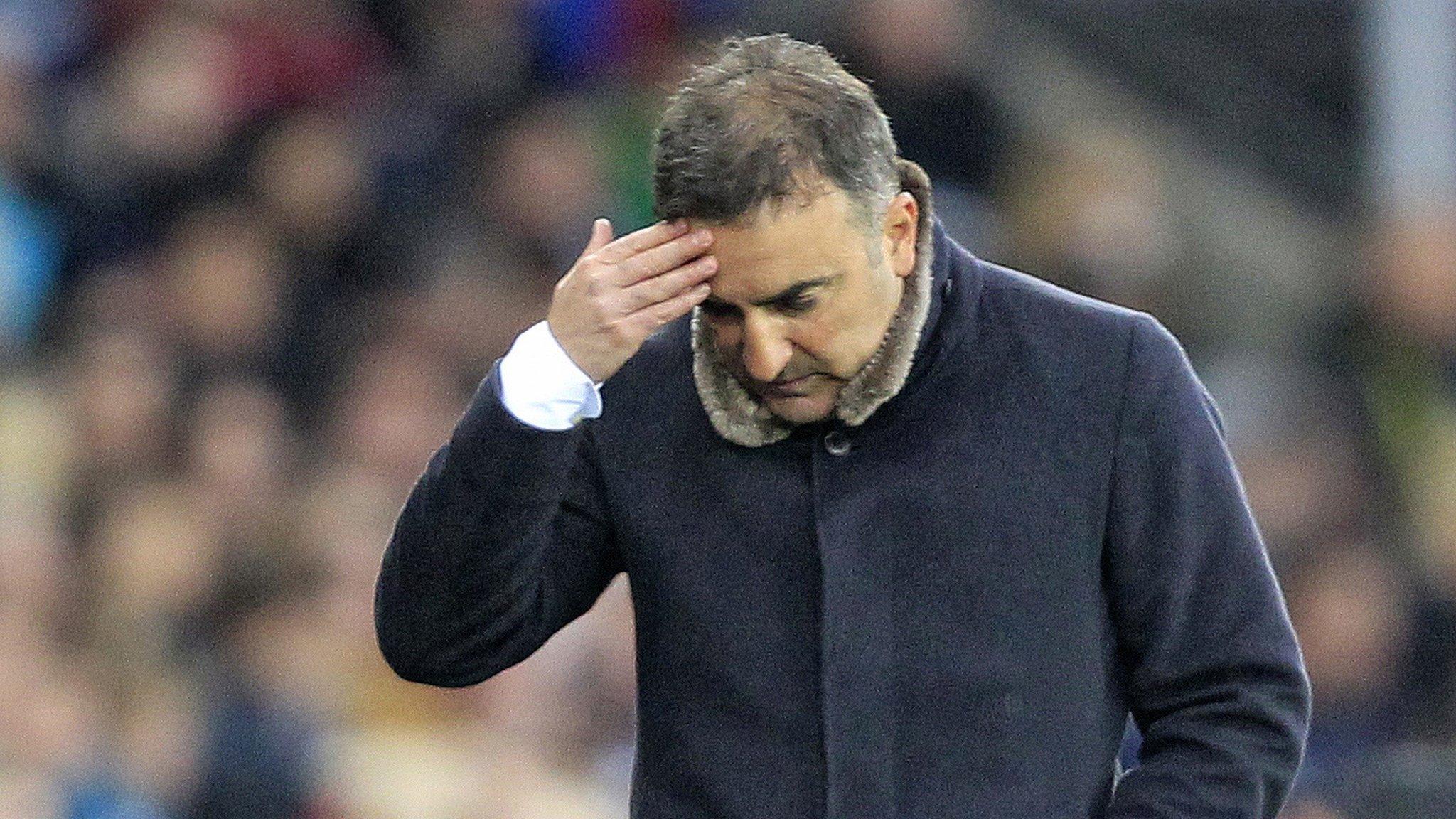 Manager Carlos Carvalhal (R) has watched his Swansea side fall back into relegation danger