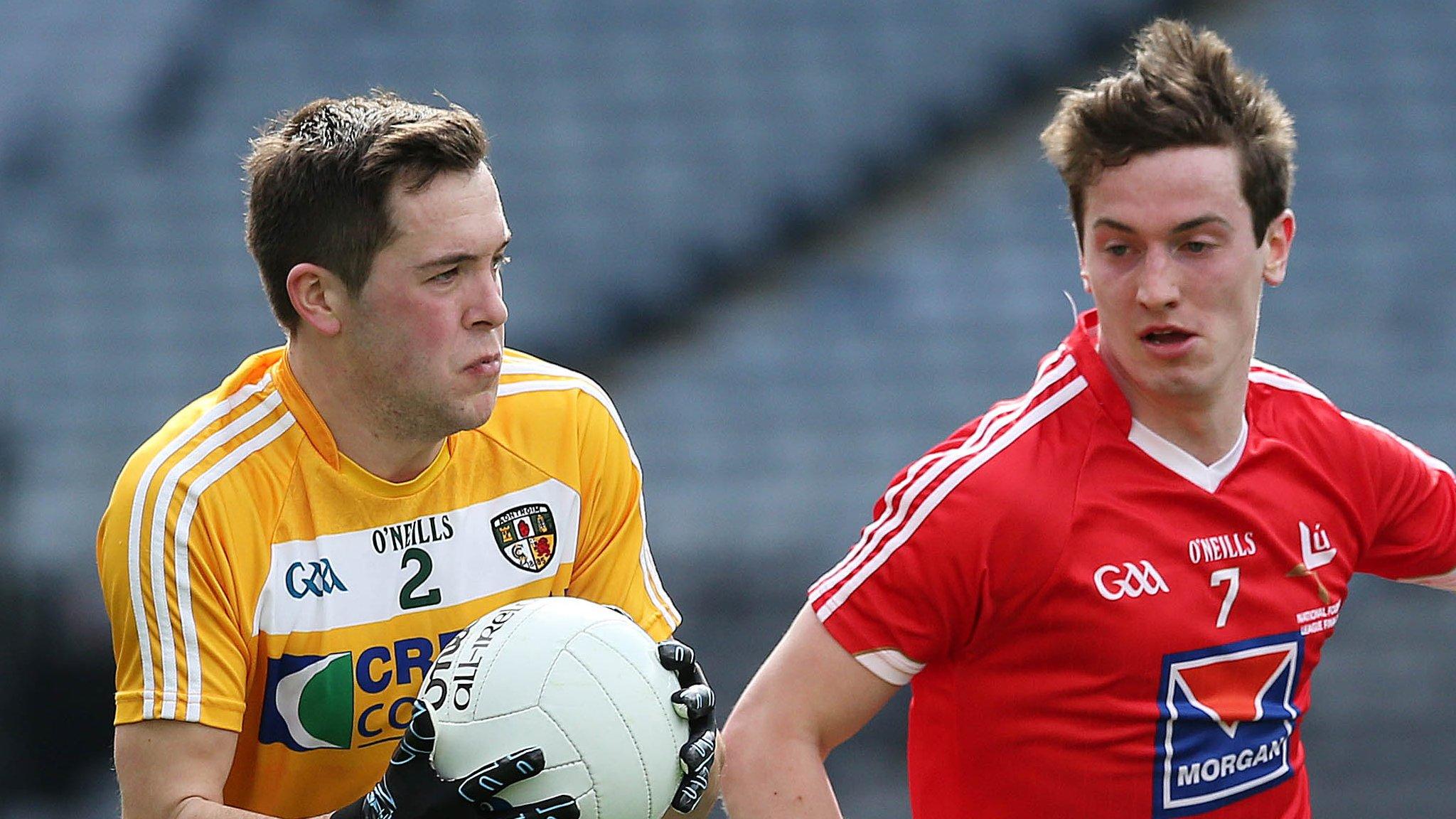 Antrim's Niall Delargy battles with Louth's Eoghan Lafferty at Croke Park