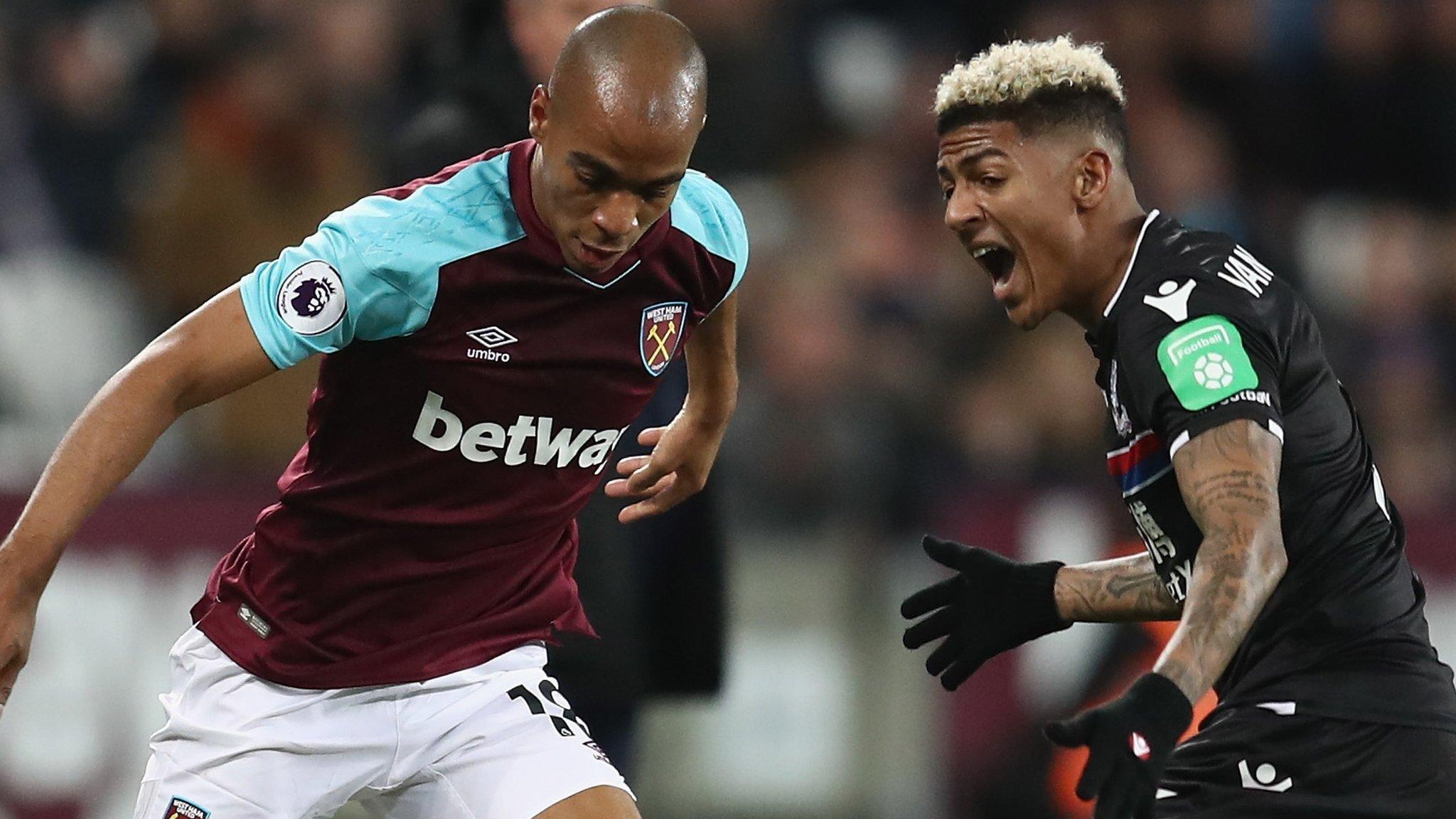 West Ham's Joao Mario takes on Patrick van Aanholt of Crystal Palace