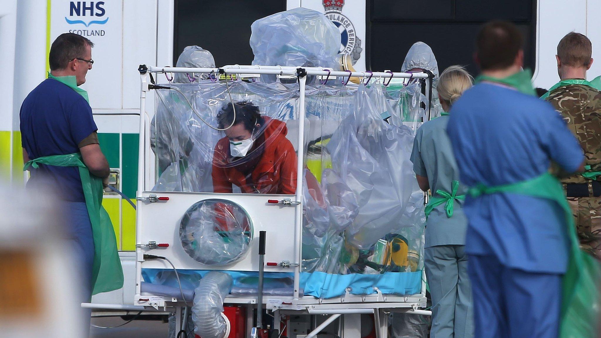 Pauline Cafferkey being transported onto plane