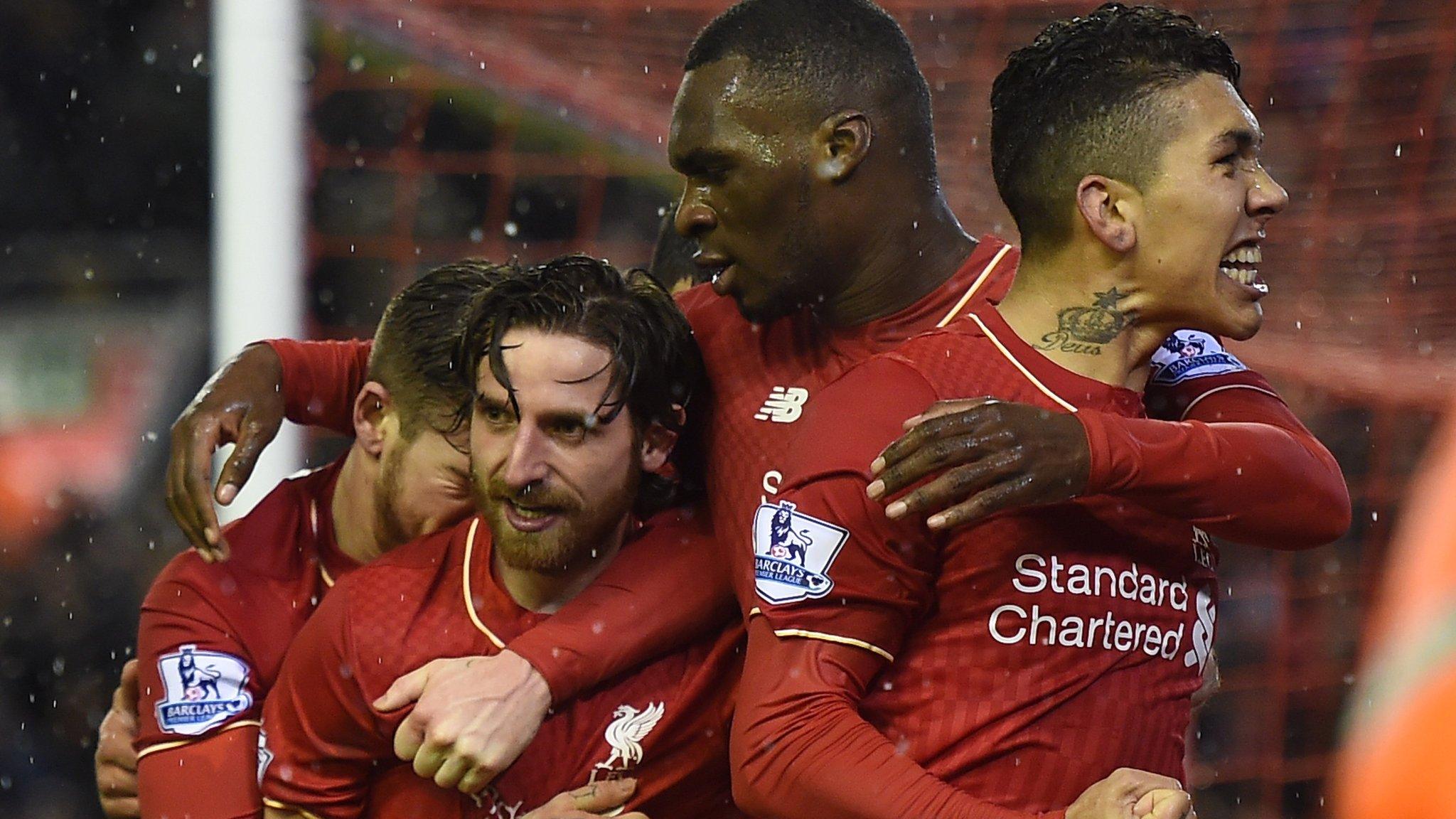 Liverpool substitute Joe Allen celebrates scoring against Arsenal