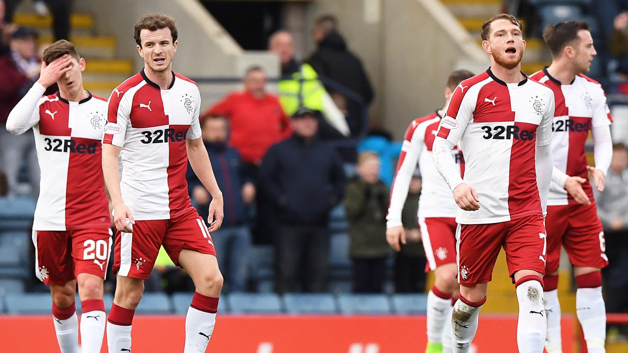 The Rangers players were left dejected after going 2-0 down at Dens Park on Sunday