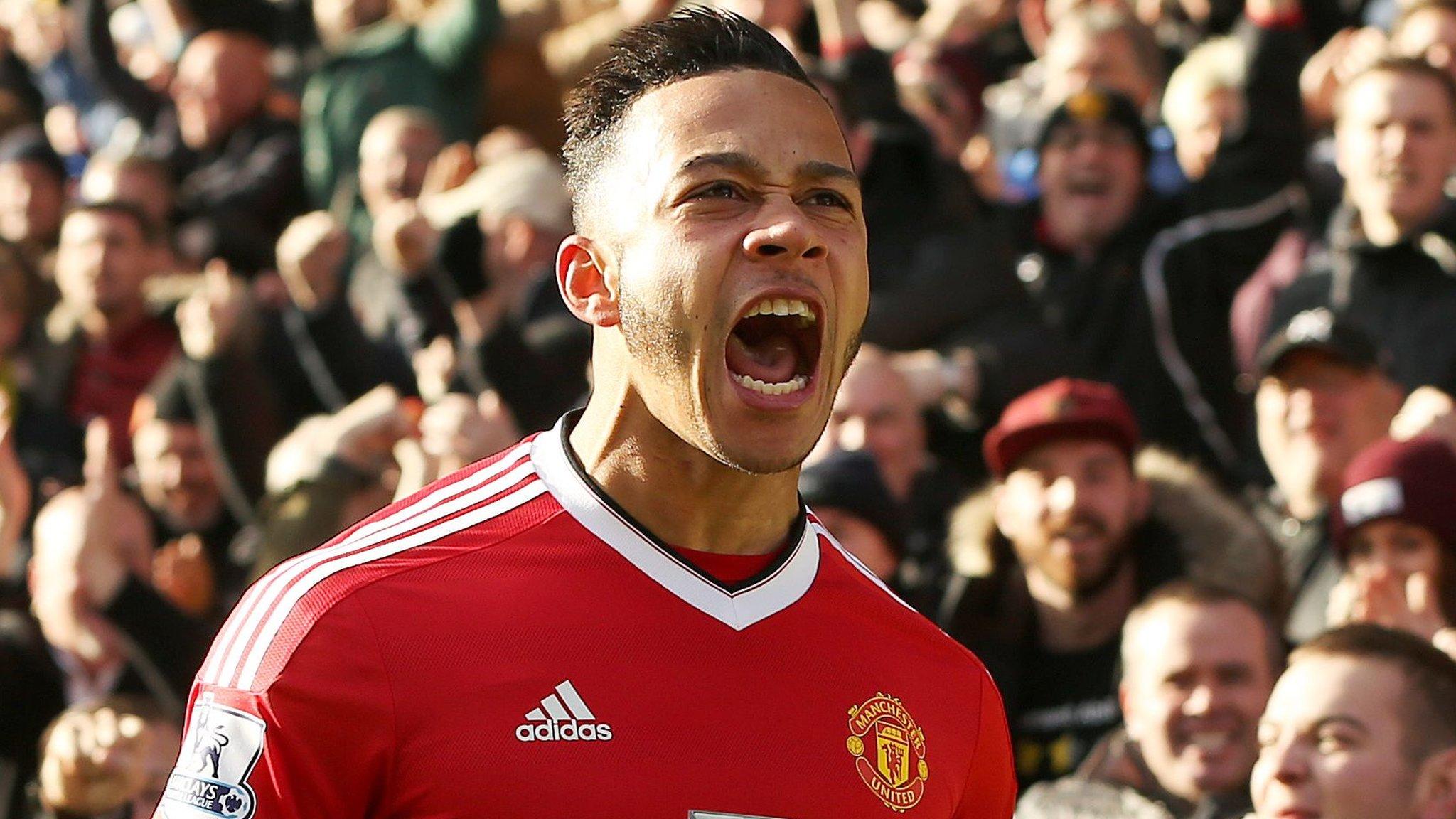 Manchester United winger Memphis Depay celebrates scoring a goal