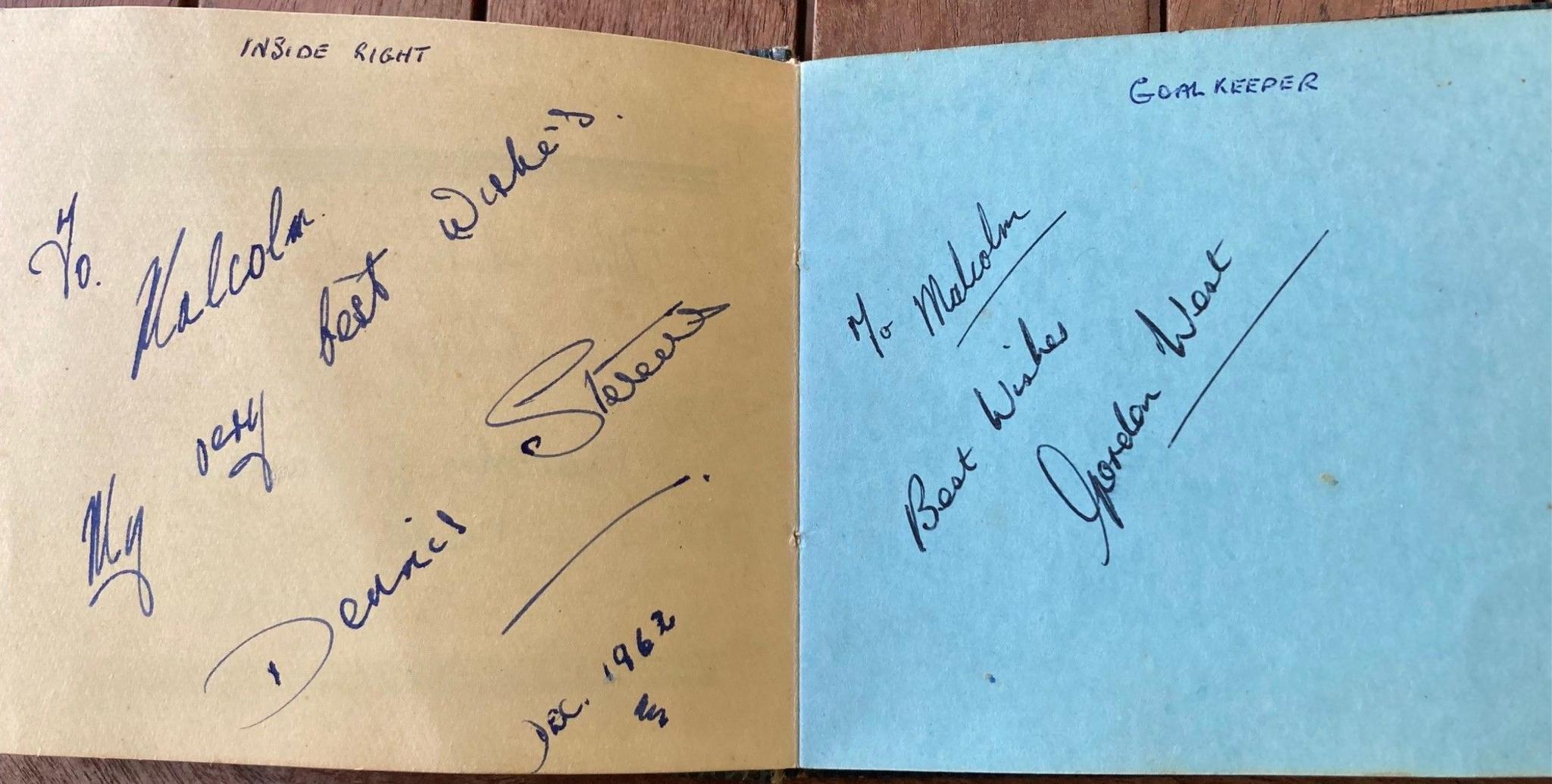 A picture of a card with signatures from Daniel Stevens and Gordon West inside