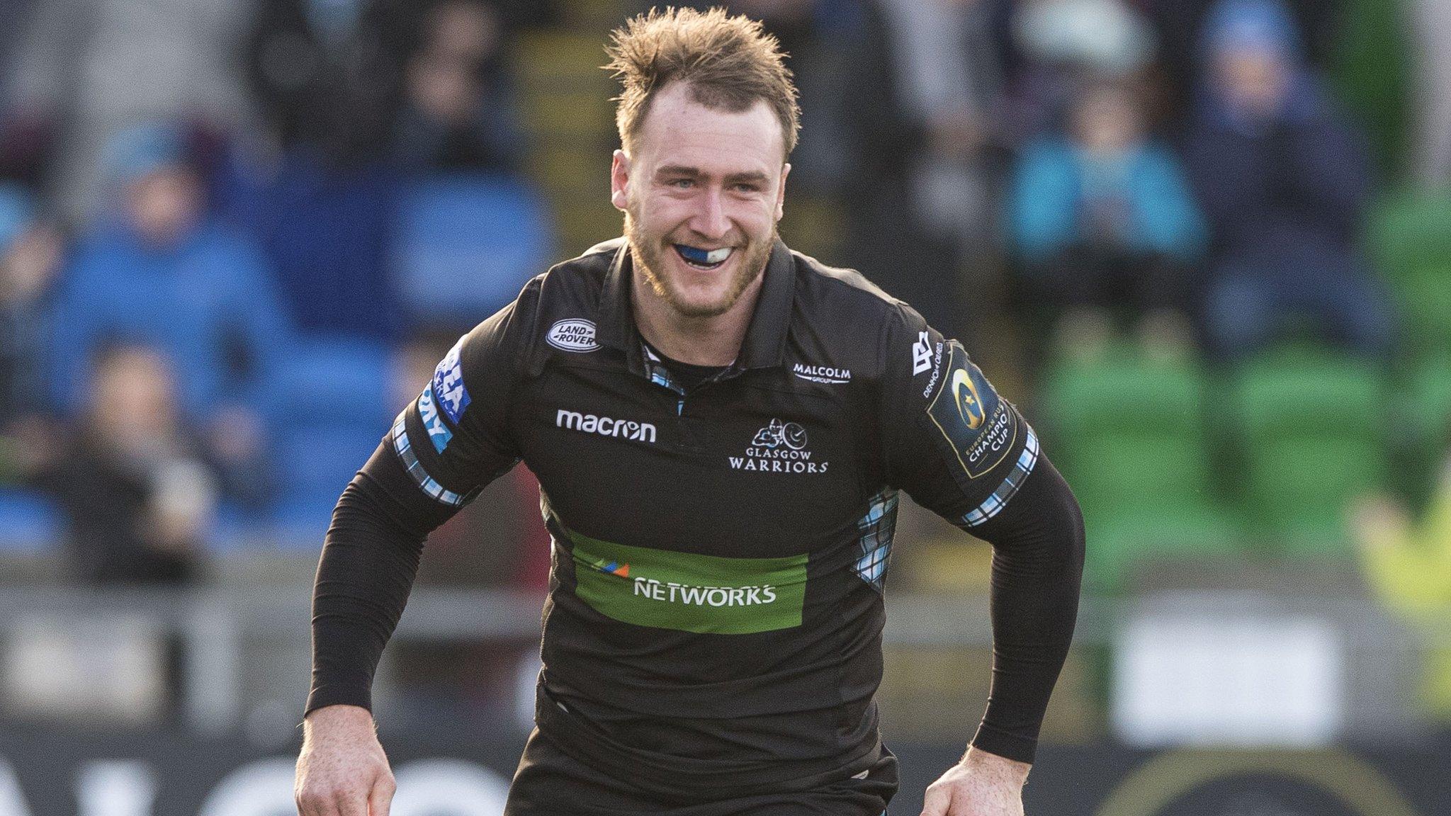 Stuart Hogg smiles after scoring an early try for Glasgow