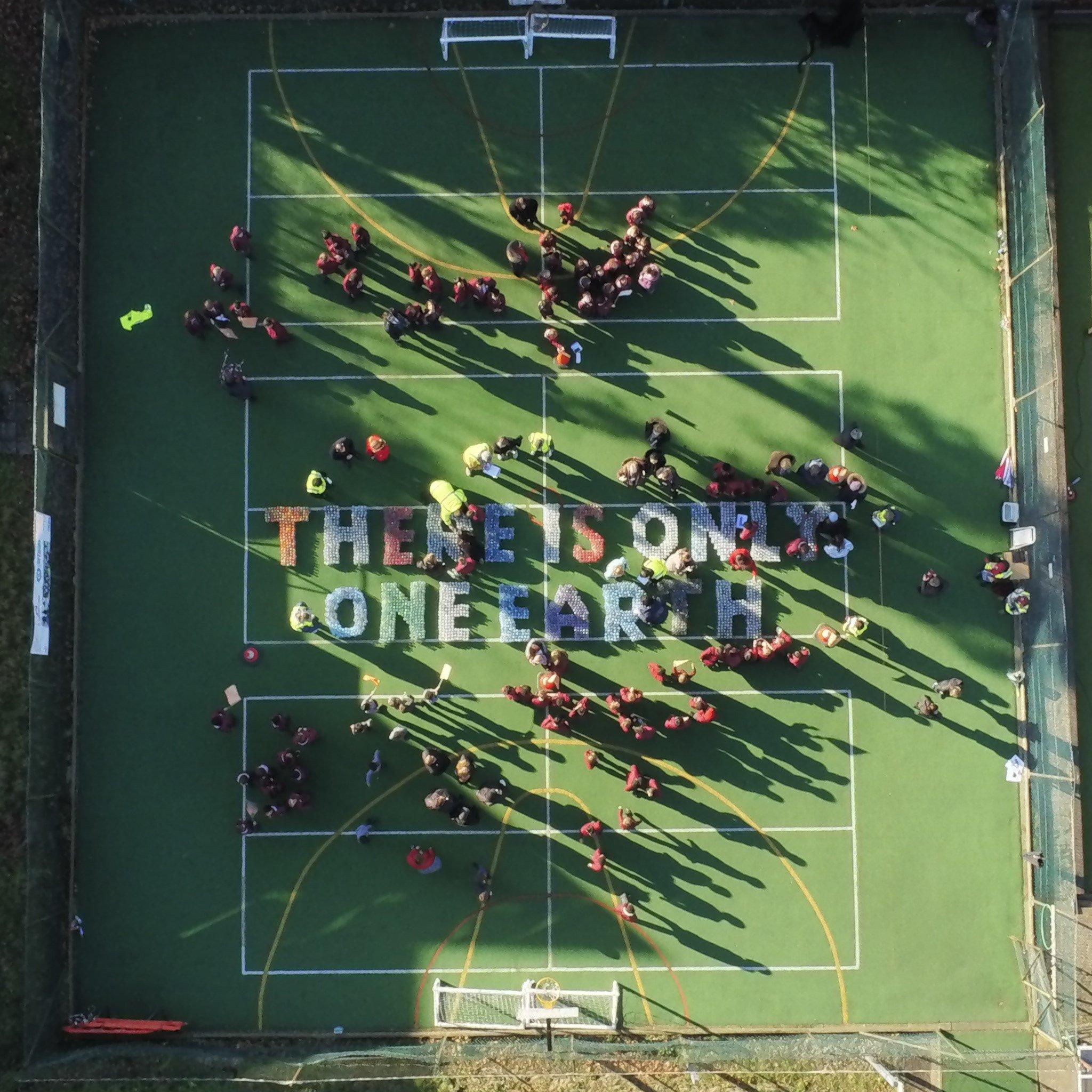 St Edward’s Prep spelling "There is only one Earth" in plastic bottles